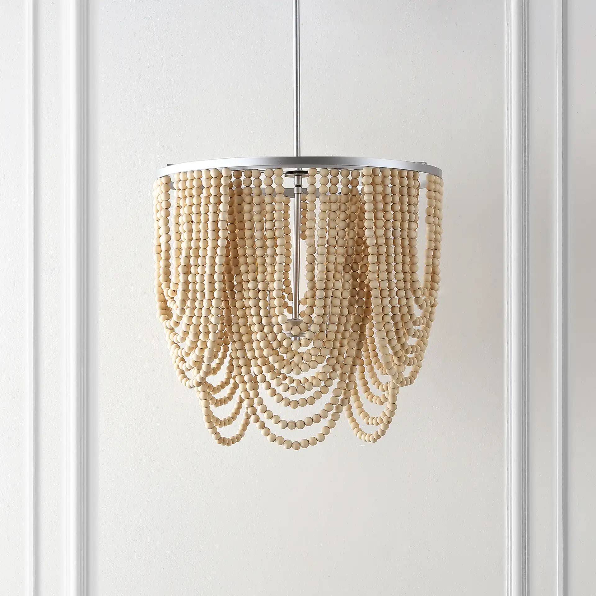 Bressi Four-Light Chandelier in Silver / Natural in a styled room