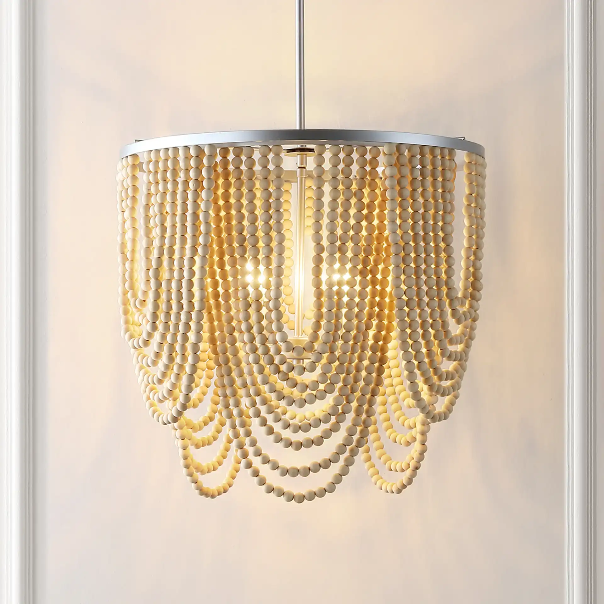 Bressi Four-Light Chandelier in Silver / Natural in a styled room