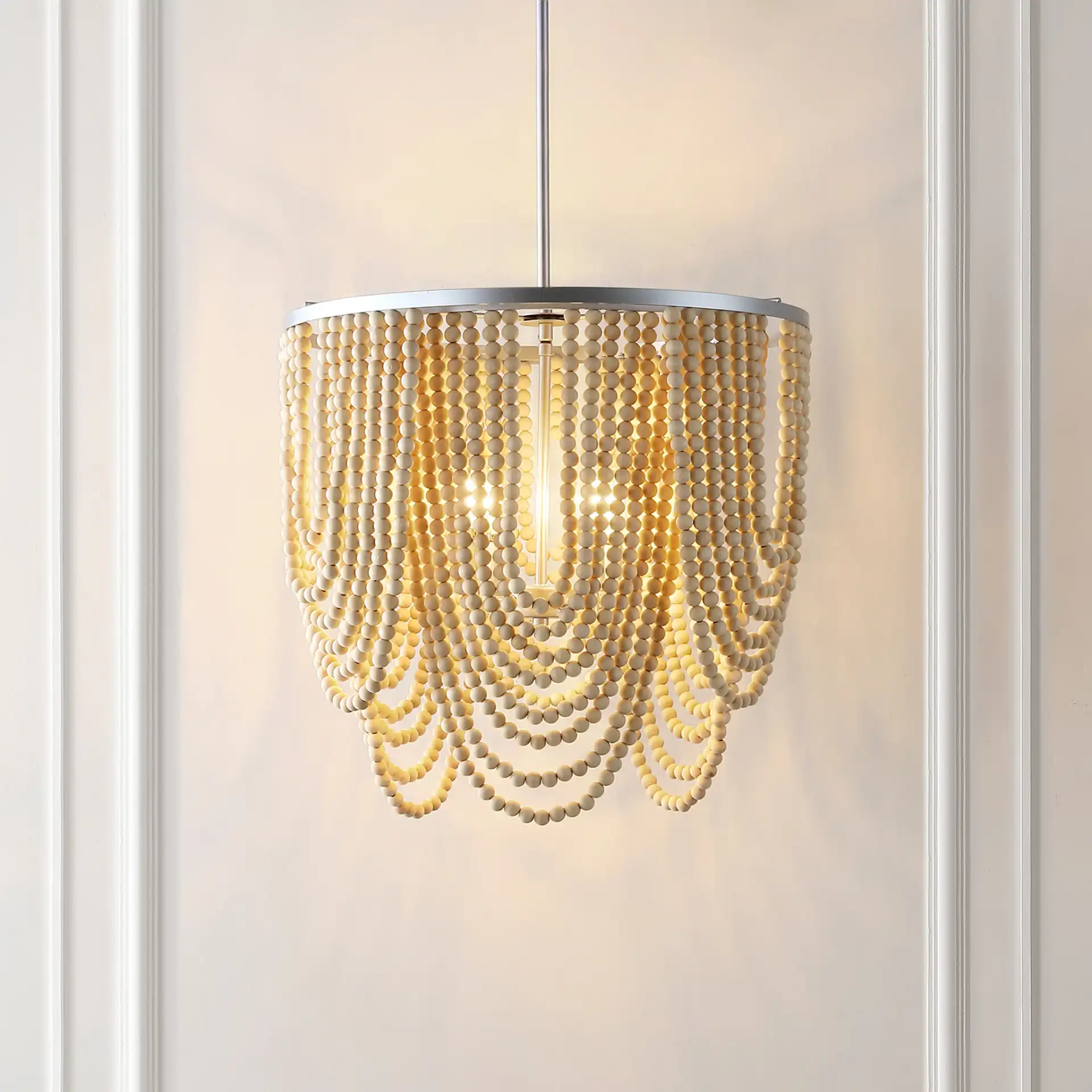 Bressi Four-Light Chandelier in Silver / Natural in a styled room
