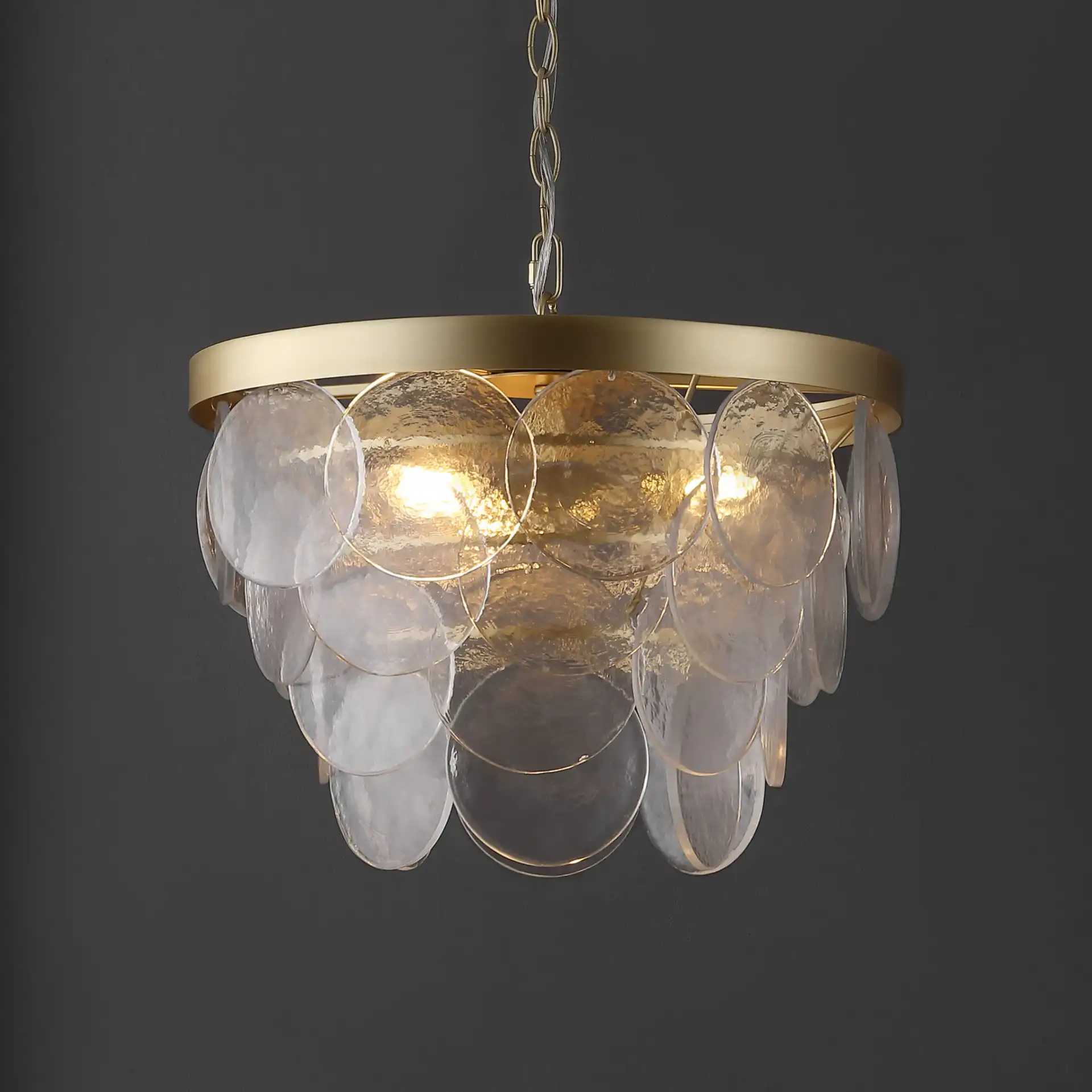 Chrys Three-Light Chandelier in Clear / Gold in a styled room