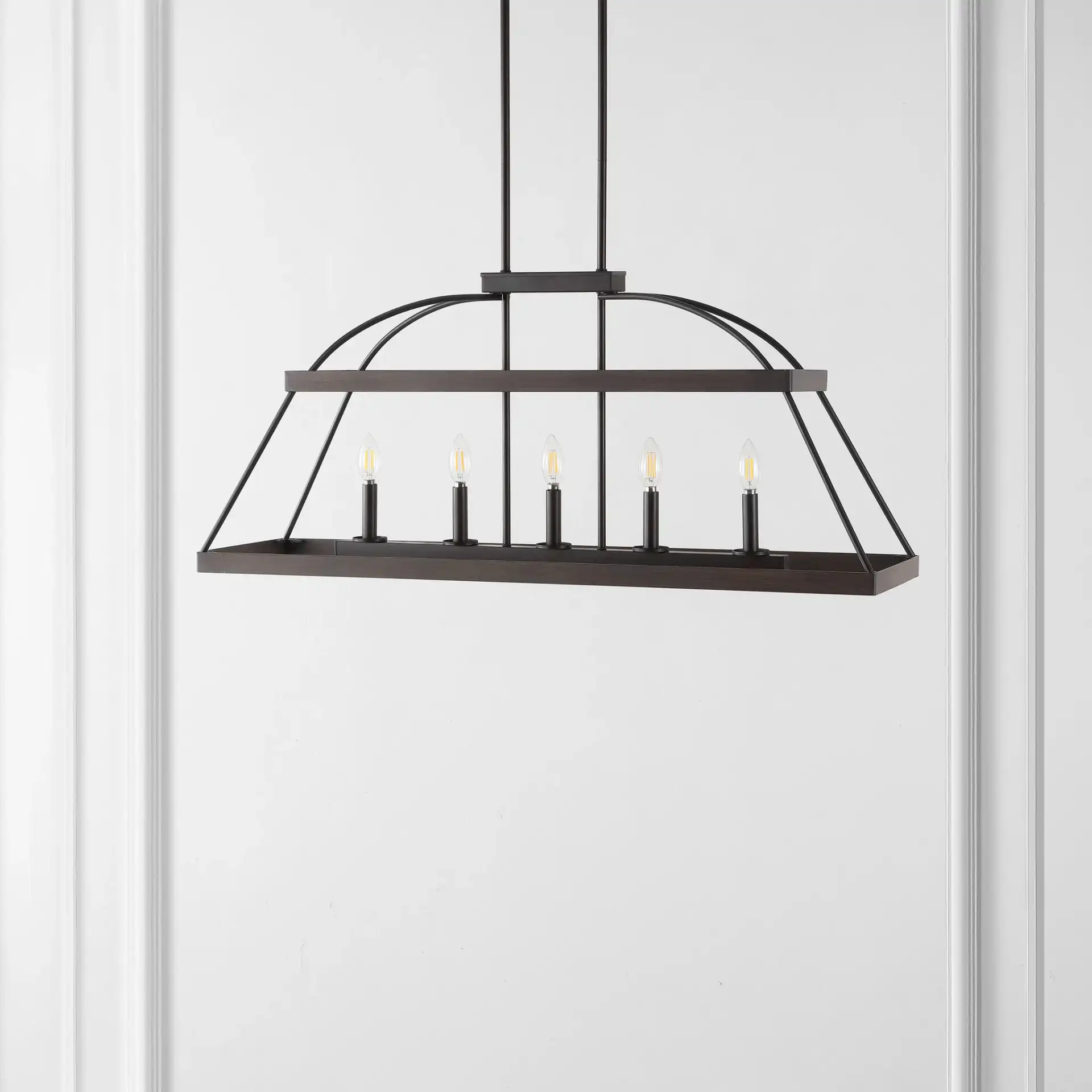 Byher Five-Light Chandelier in Walnut / Oil Rub Bronze in a styled room