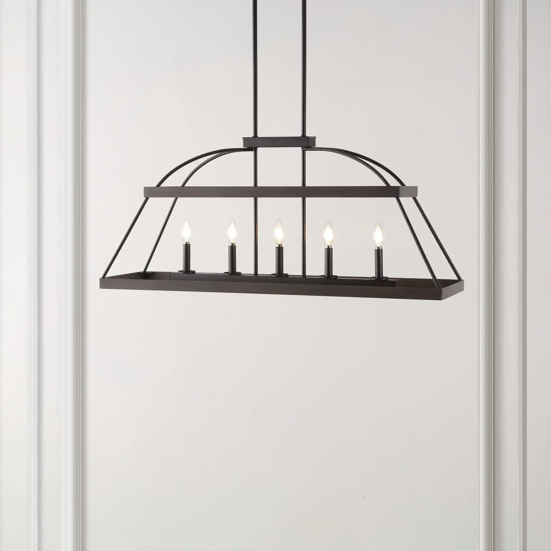 Byher Five-Light Chandelier in Walnut / Oil Rub Bronze in a styled room