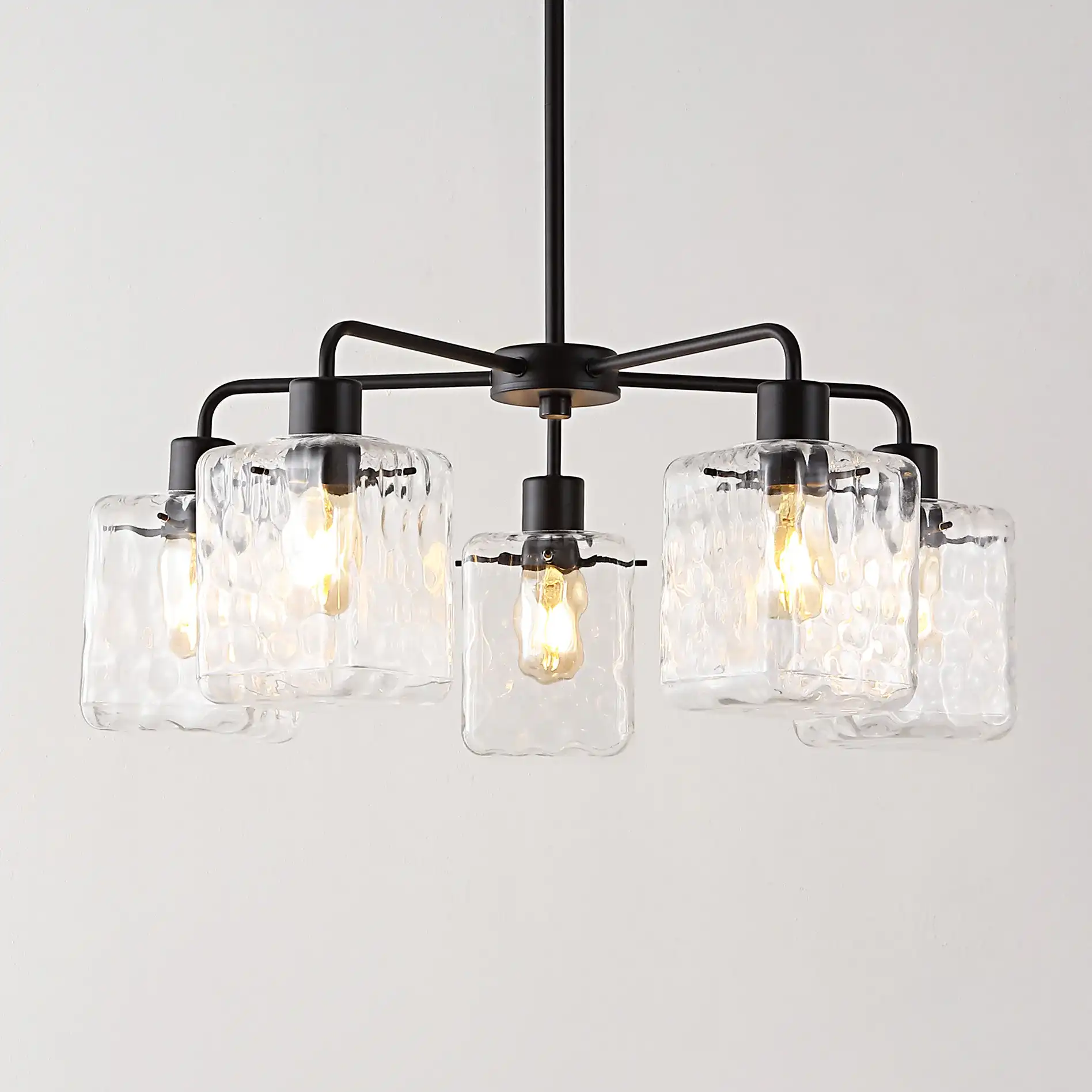 Jameson Five-Light Chandelier in Oil Rub Bronze in a styled room