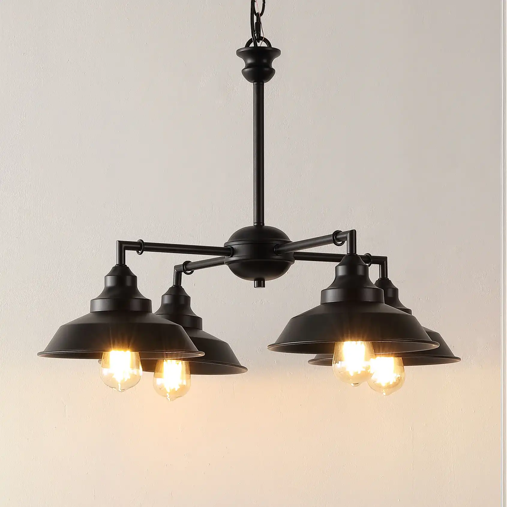 Westlyn Four-Light Chandelier in Black in a styled room
