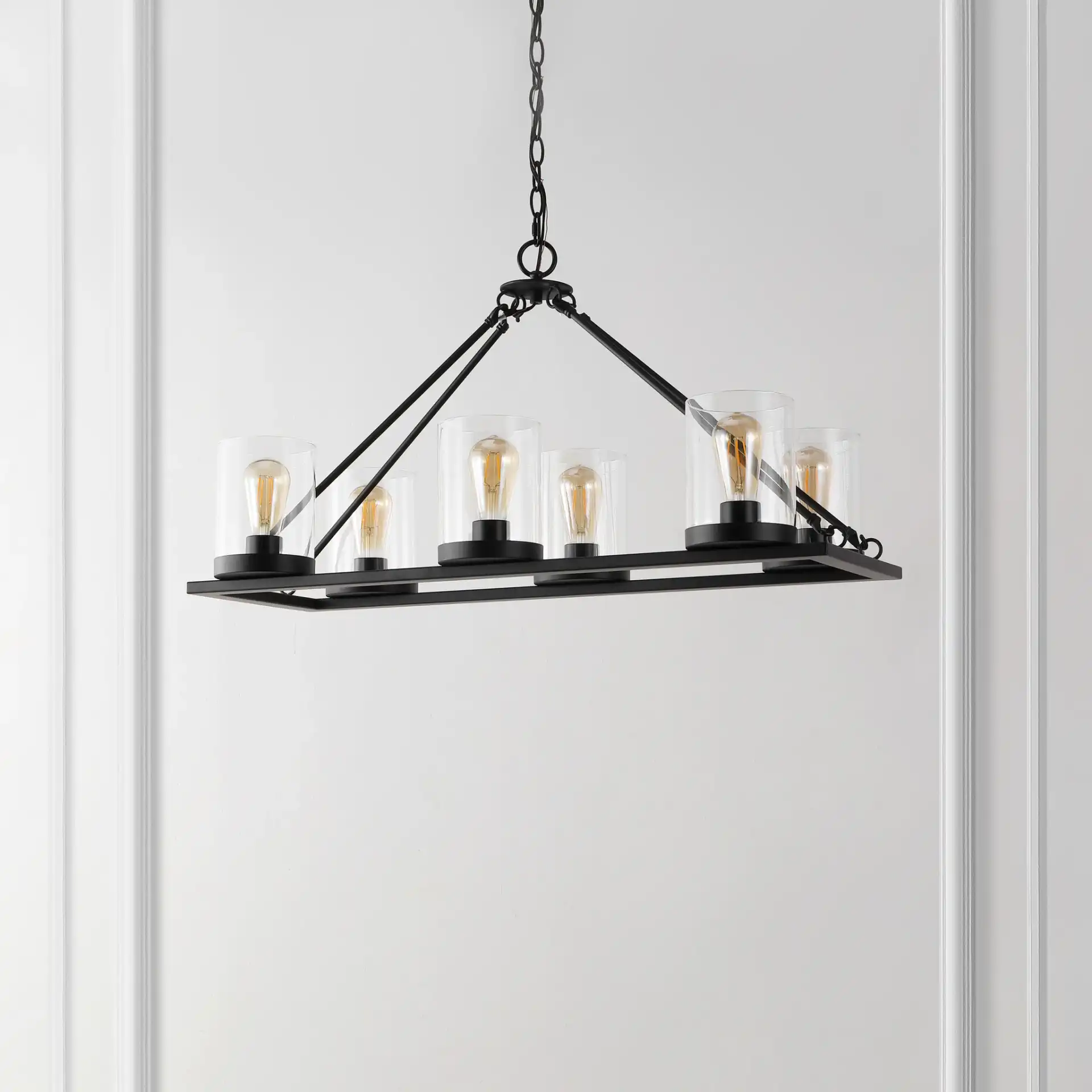 Reagan Six-Light Chandelier in Black in a styled room