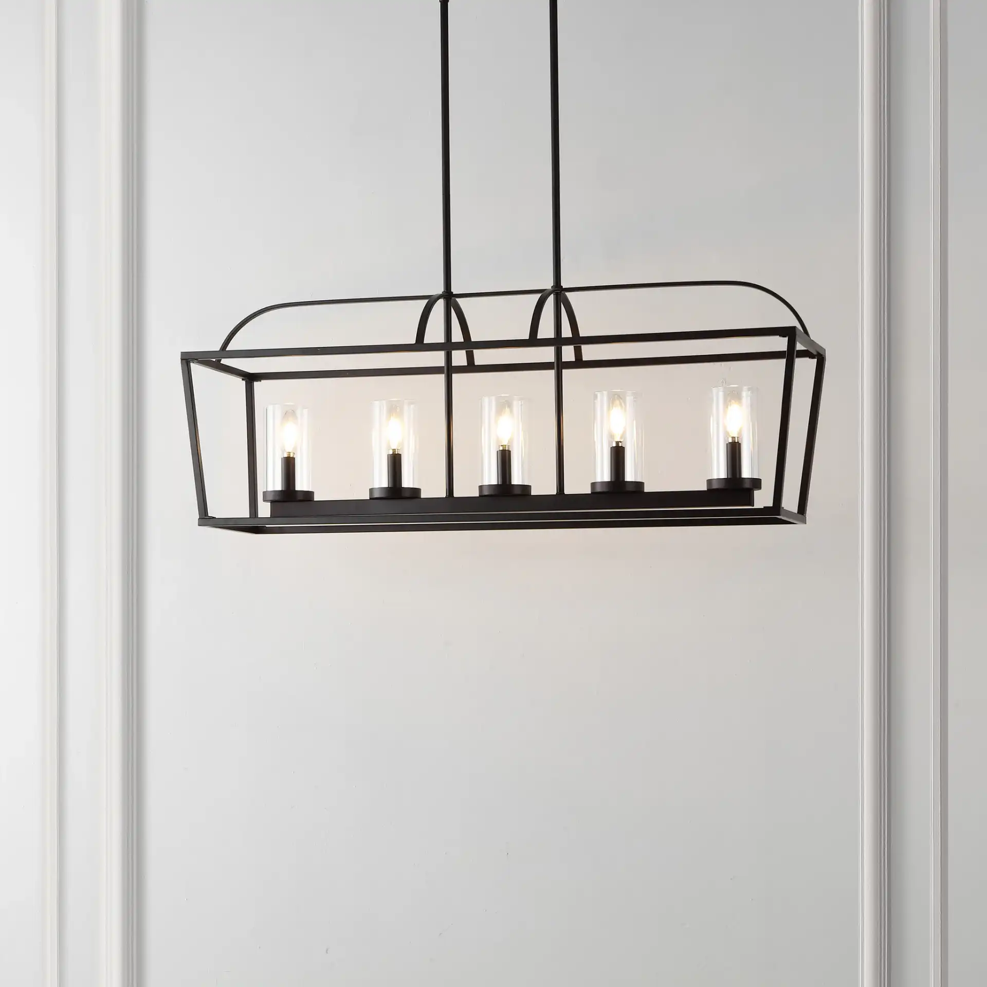 Manning Five-Light Chandelier in Oil Rub Bronze in a styled room