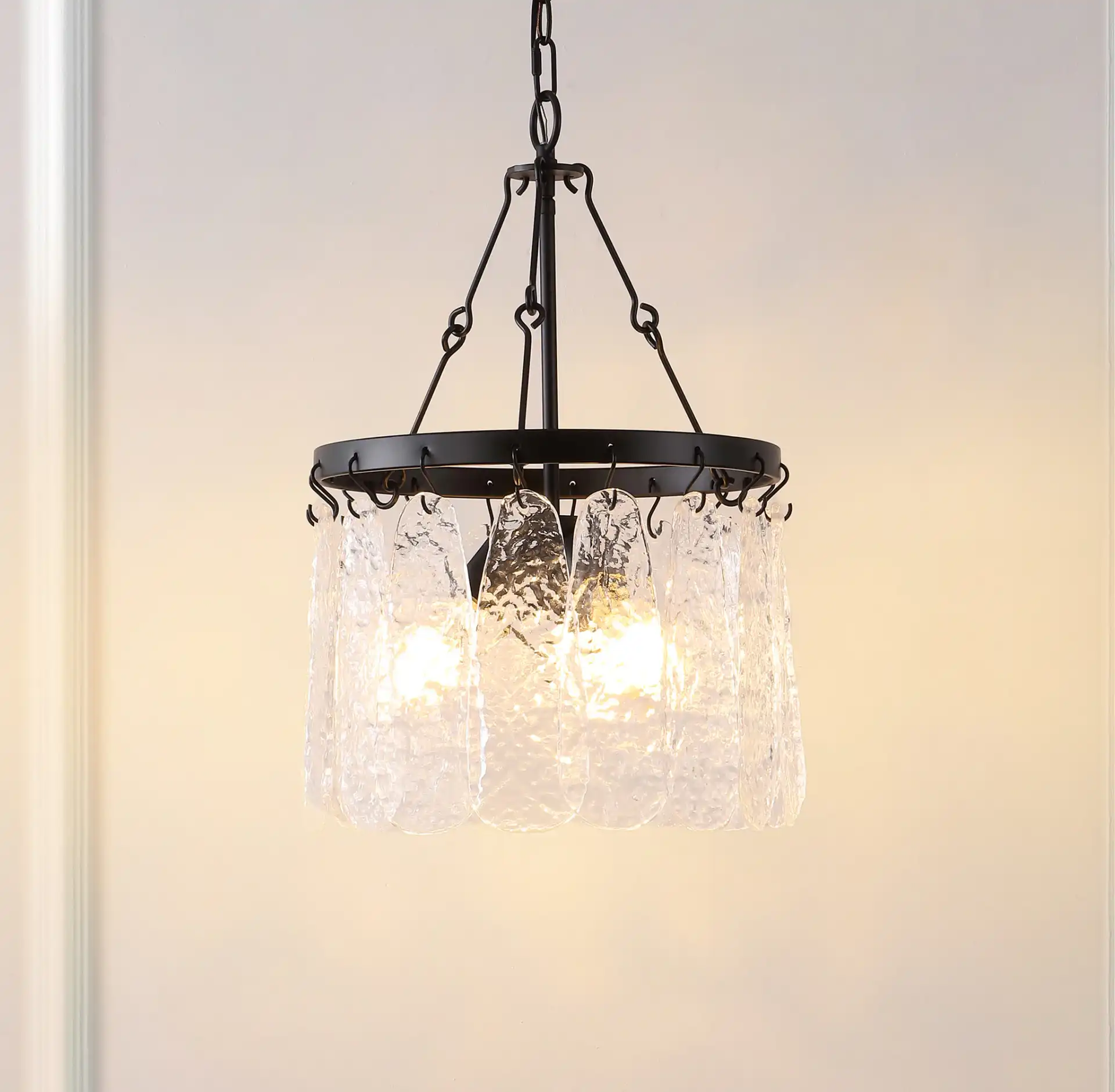 Thryssa Three-Light Chandelier in Black / Clear in a styled room