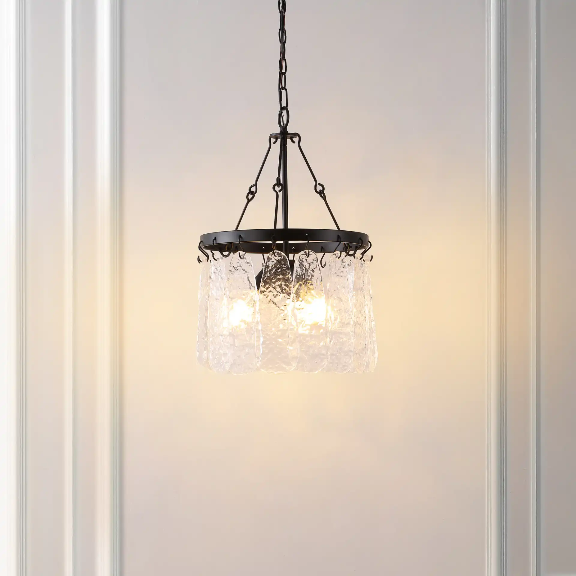 Thryssa Three-Light Chandelier in Black / Clear in a styled room