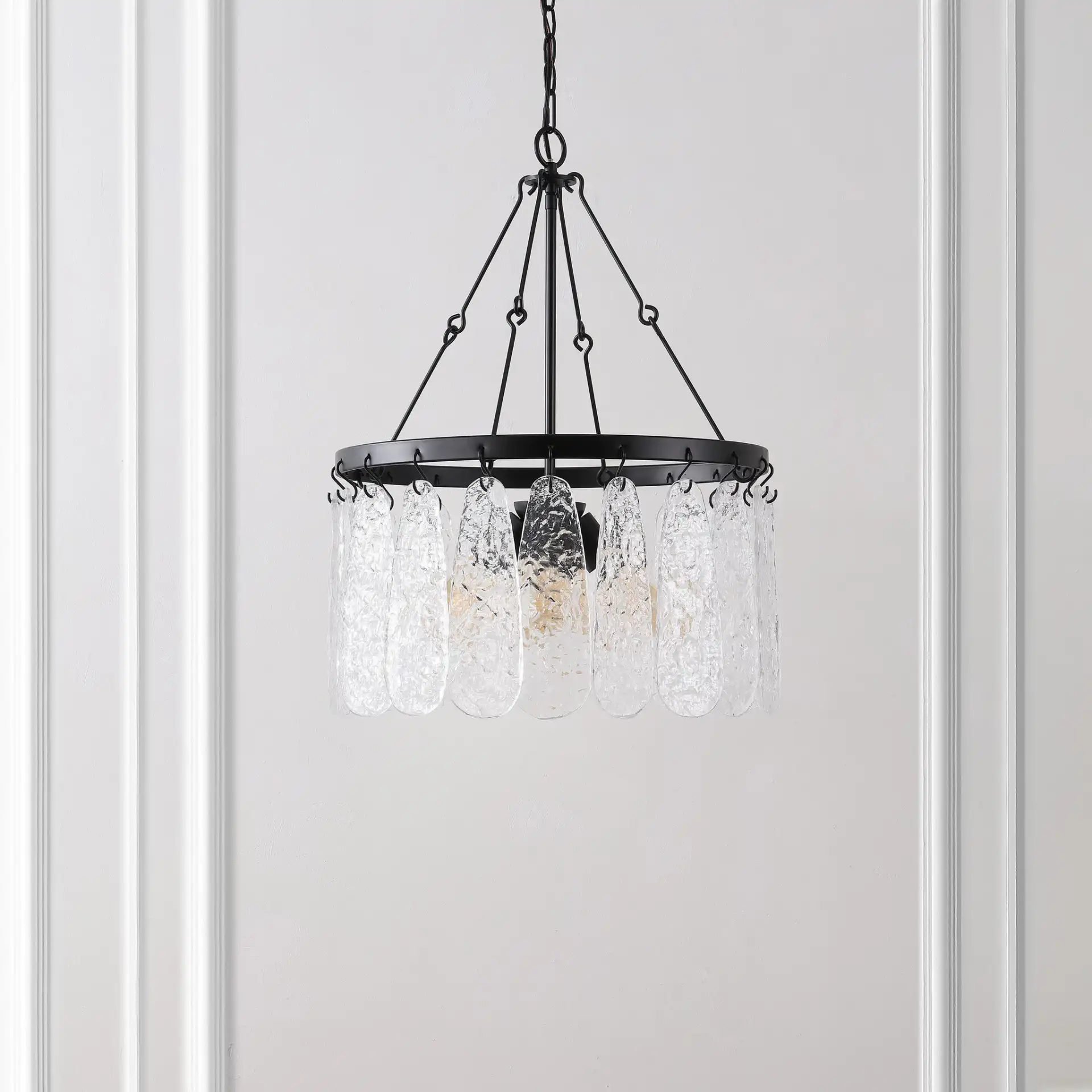Selene Four-Light Chandelier in Black / Clear in a styled room