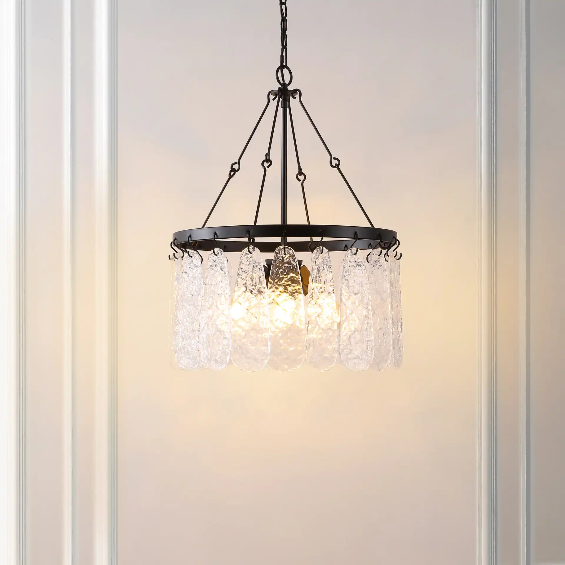 Selene Four-Light Chandelier in Black / Clear in a styled room