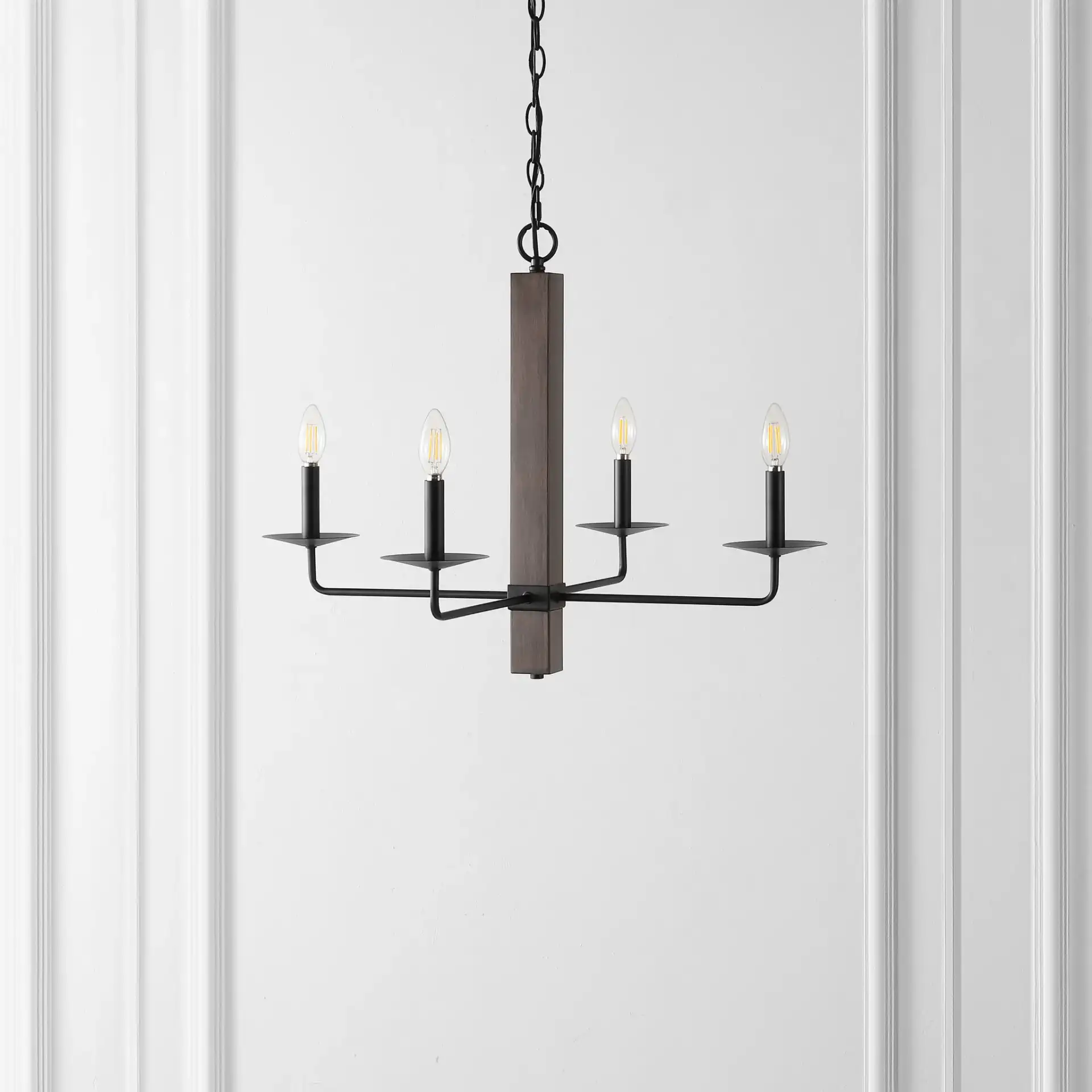Oakly Four-Light Chandelier in Black / Walnut in a styled room