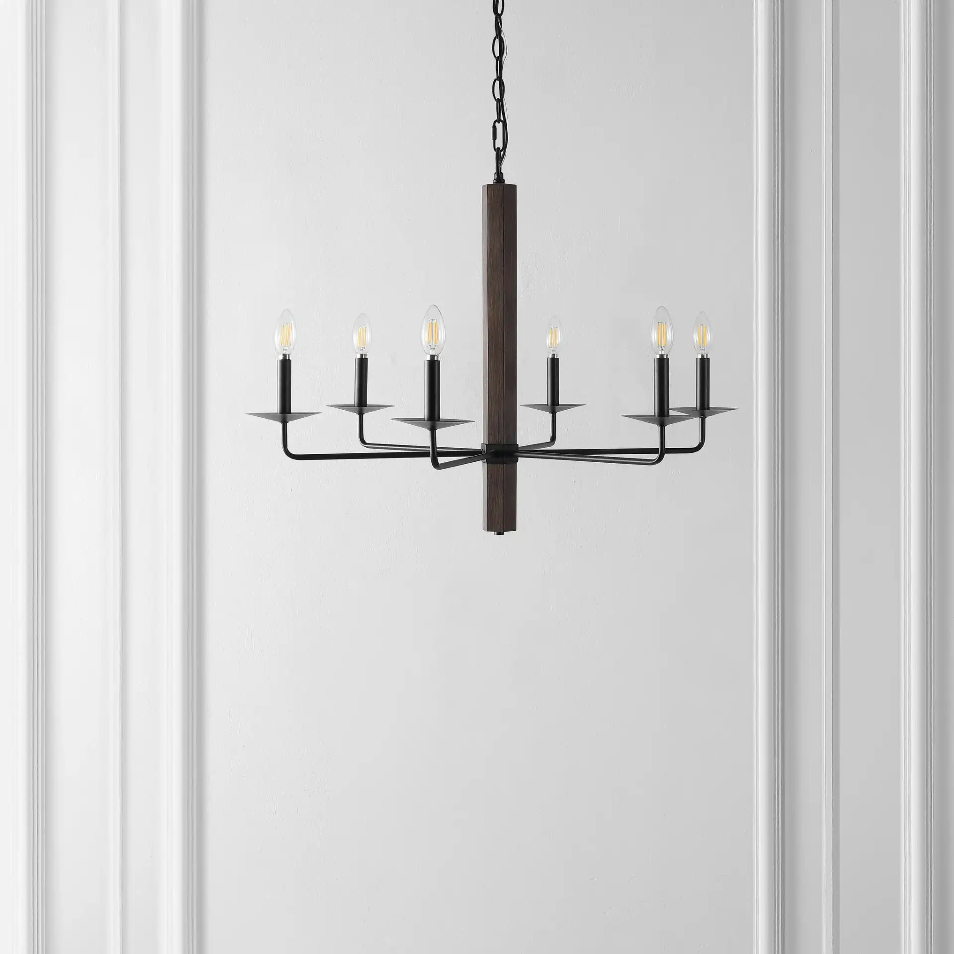 Penbrook Six-Light Chandelier in Black / Walnut in a styled room