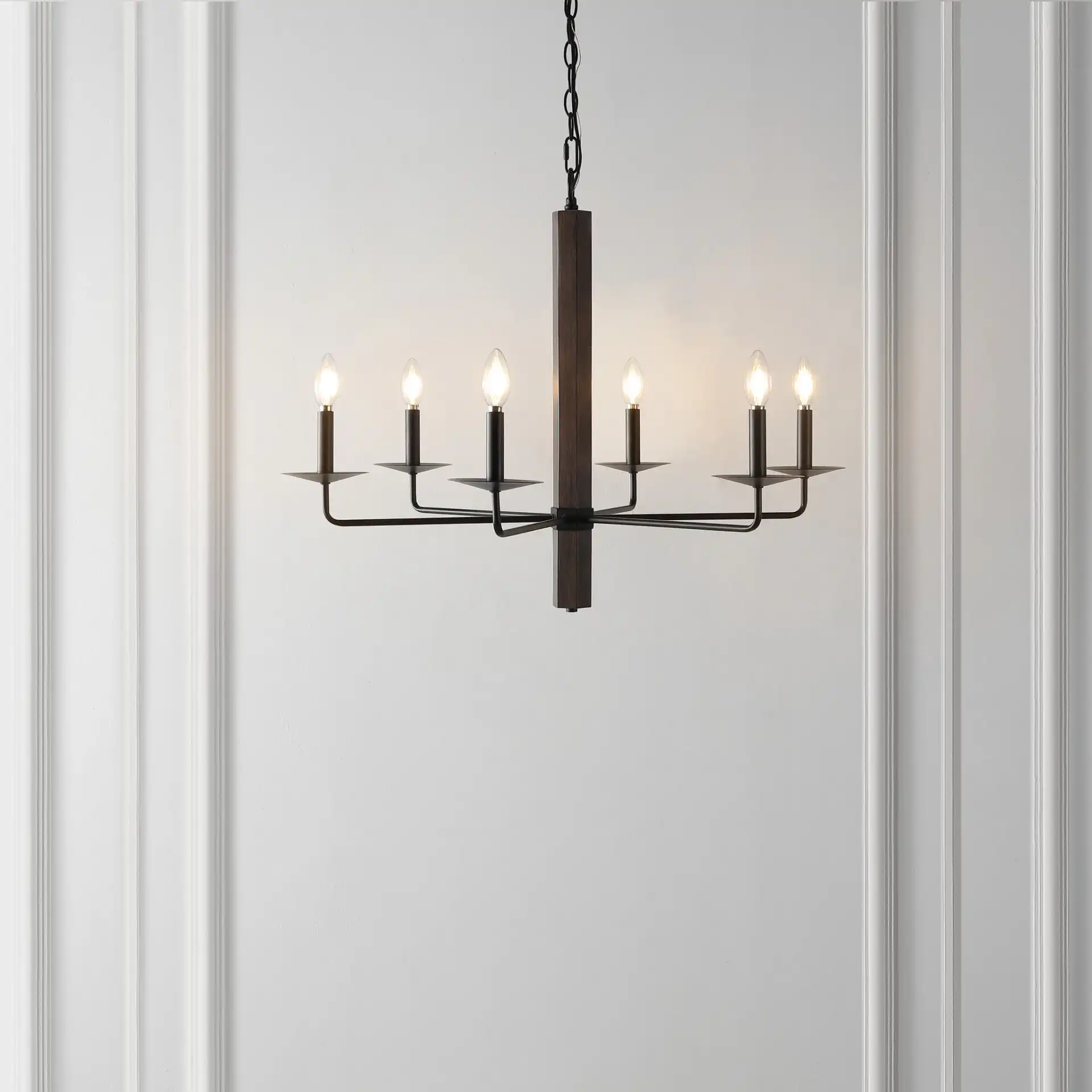 Penbrook Six-Light Chandelier in Black / Walnut in a styled room