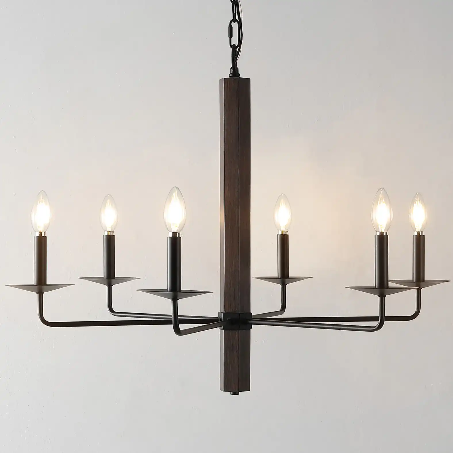 Penbrook Six-Light Chandelier in Black / Walnut in a styled room