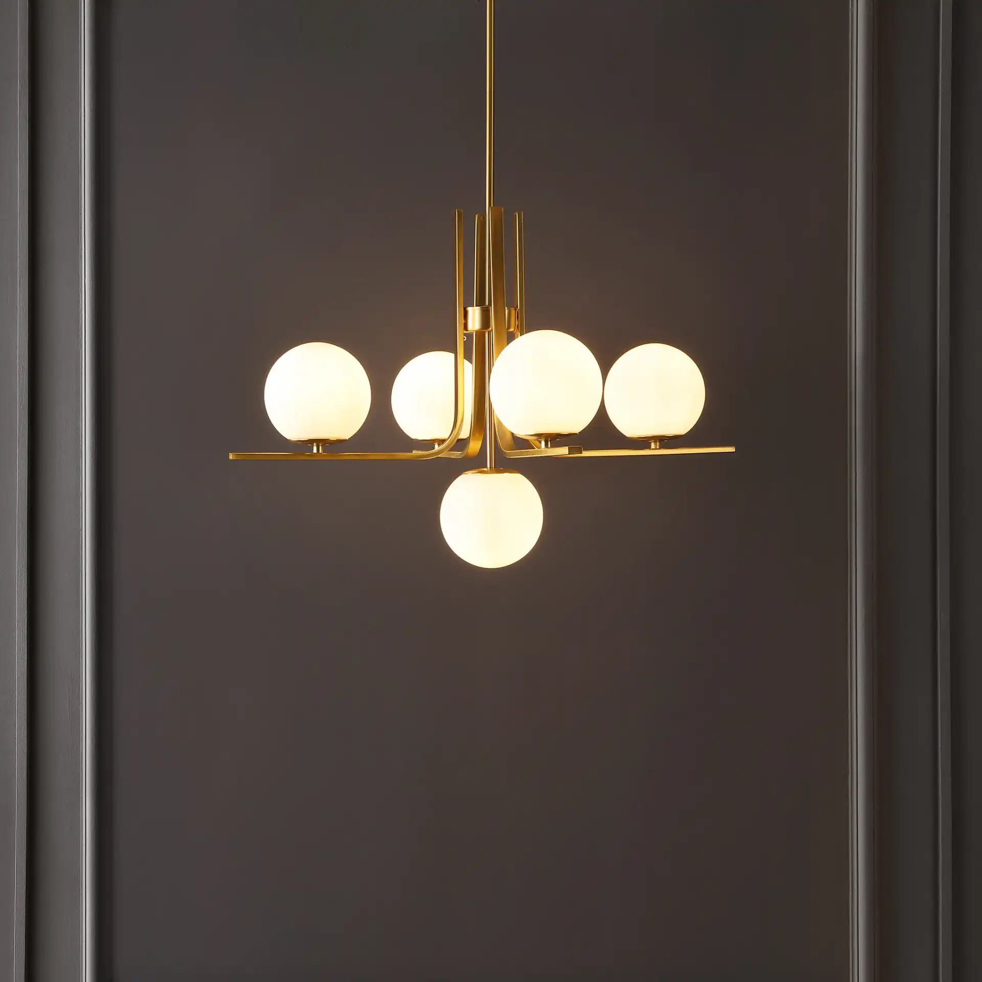 Lenore Five-Light Chandelier in Gold in a styled room