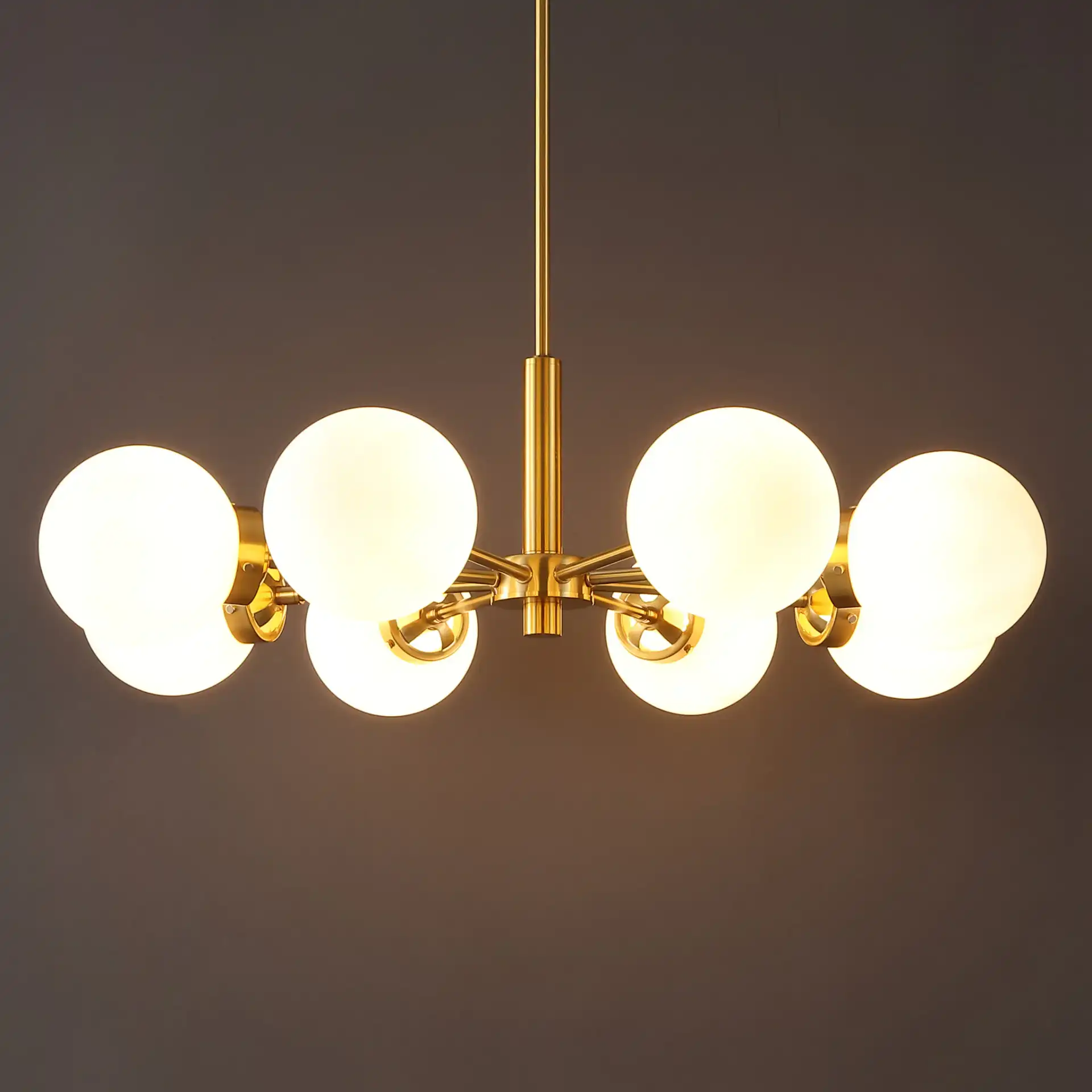Prosie Eight-Light Chandelier in Gold in a styled room