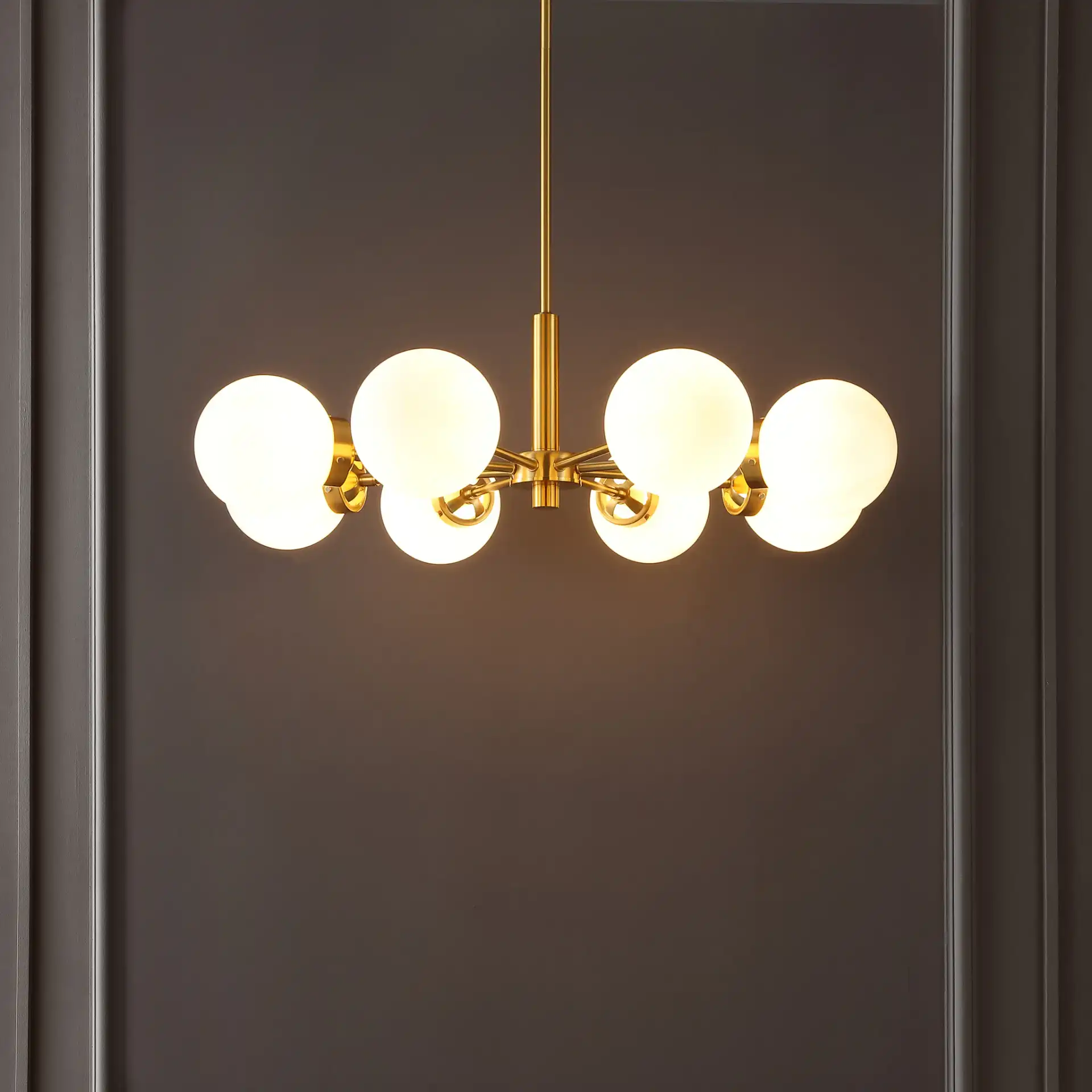 Prosie Eight-Light Chandelier in Gold in a styled room
