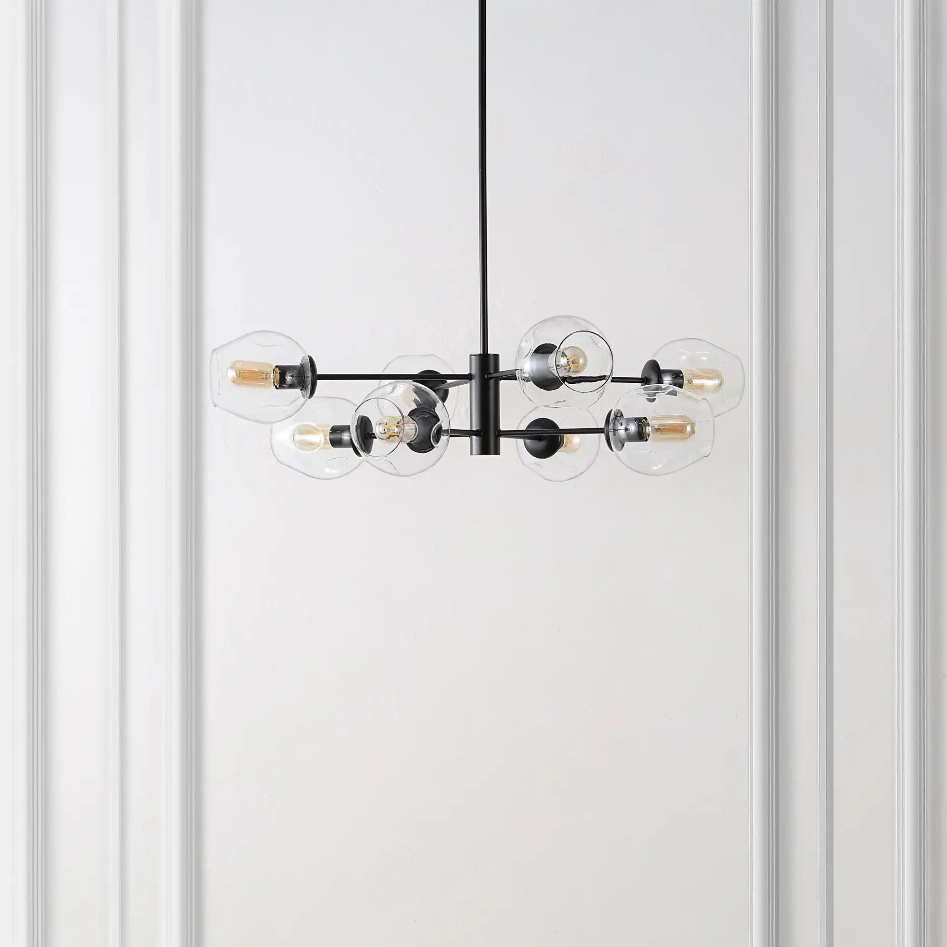 Pythea Eight-Light Chandelier in Black in a styled room