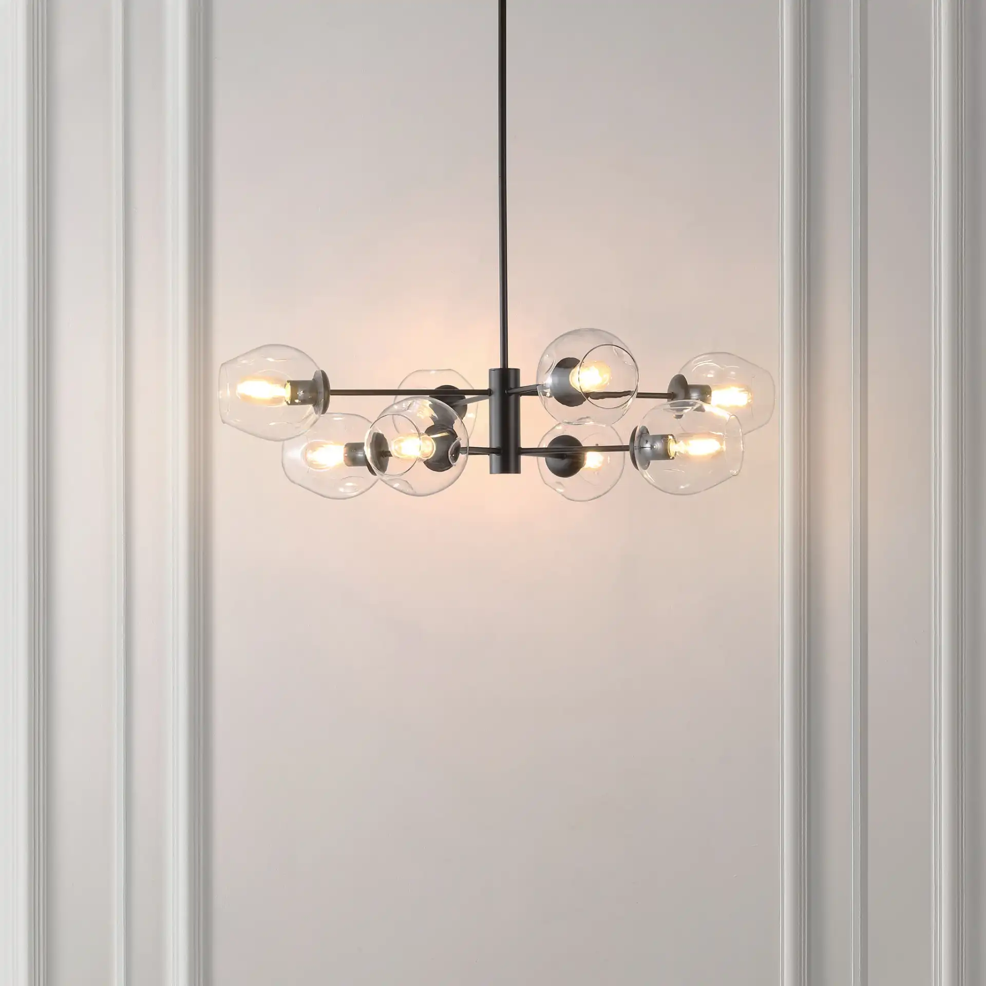Pythea Eight-Light Chandelier in Black in a styled room