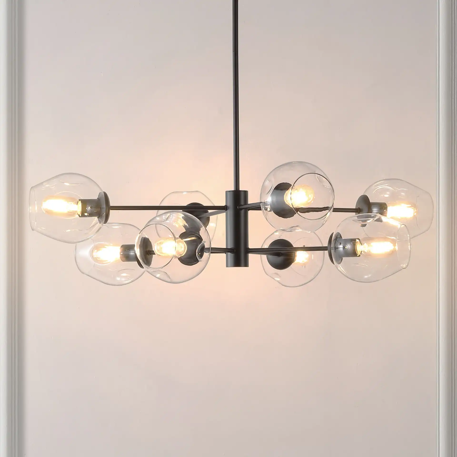 Pythea Eight-Light Chandelier in Black in a styled room