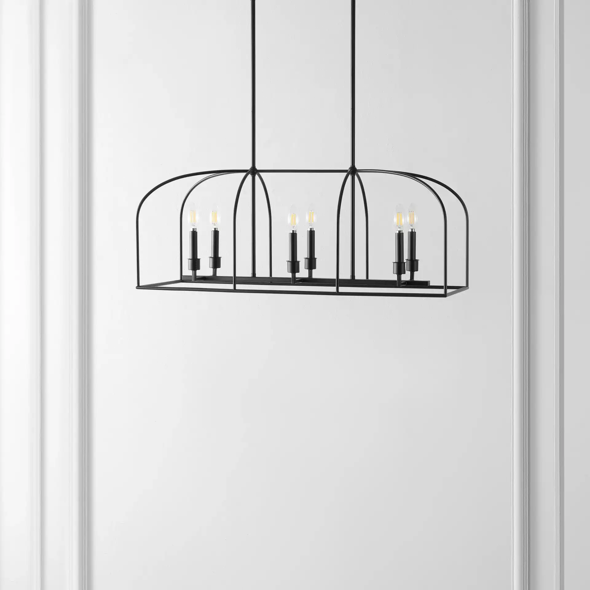 Bryndan Six-Light Chandelier in Black in a styled room