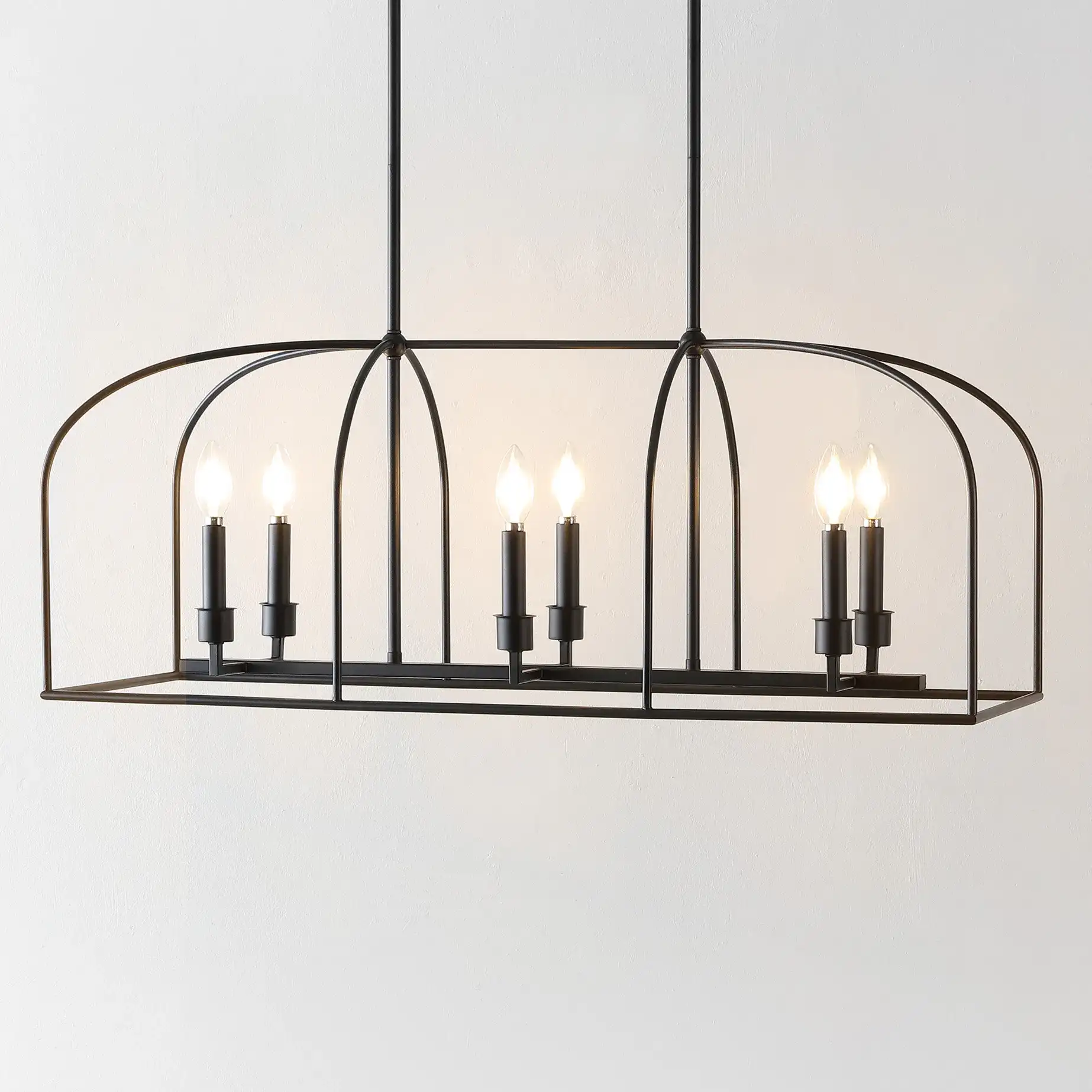 Bryndan Six-Light Chandelier in Black in a styled room