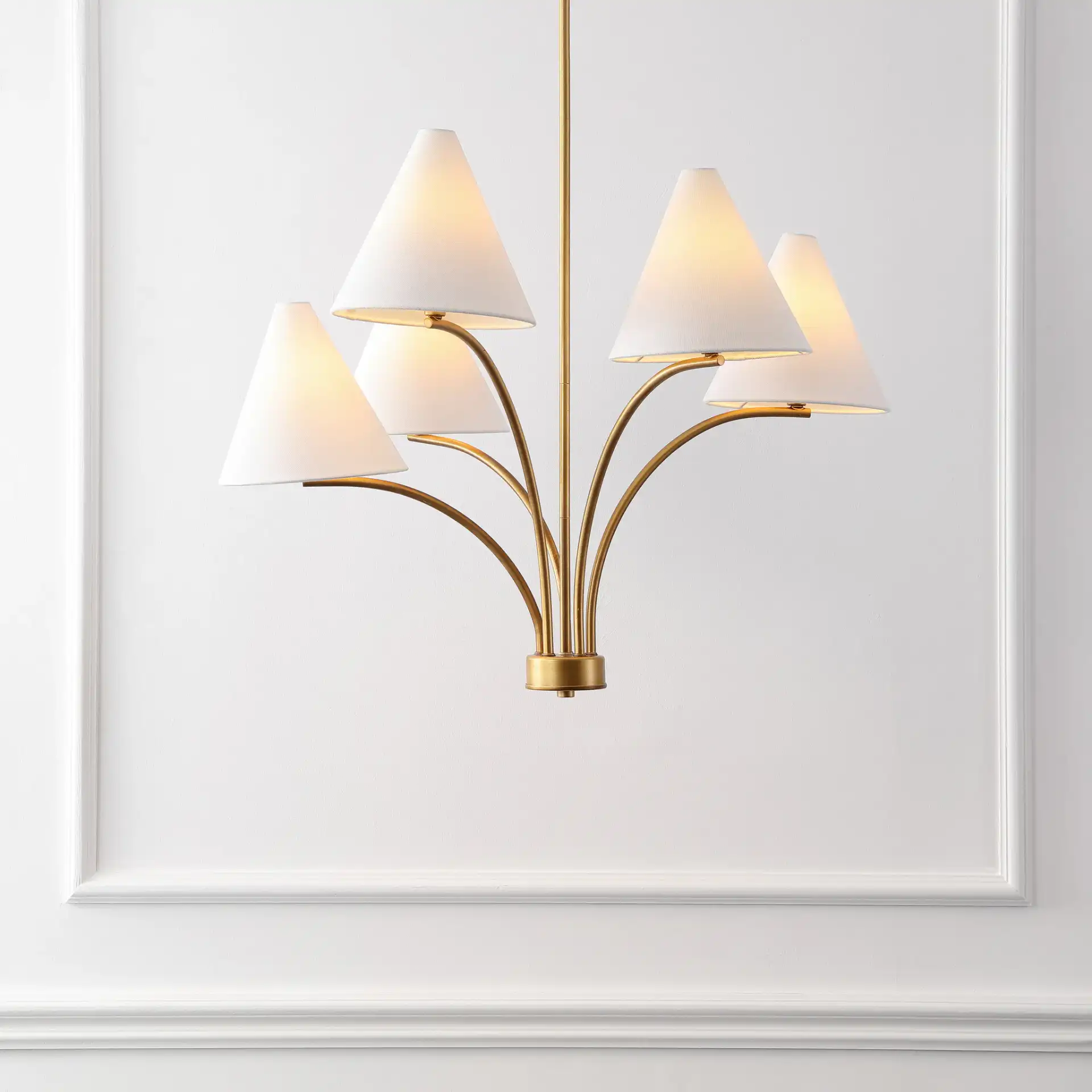 Johanna Five-Light Chandelier in Antique Brass in a styled room