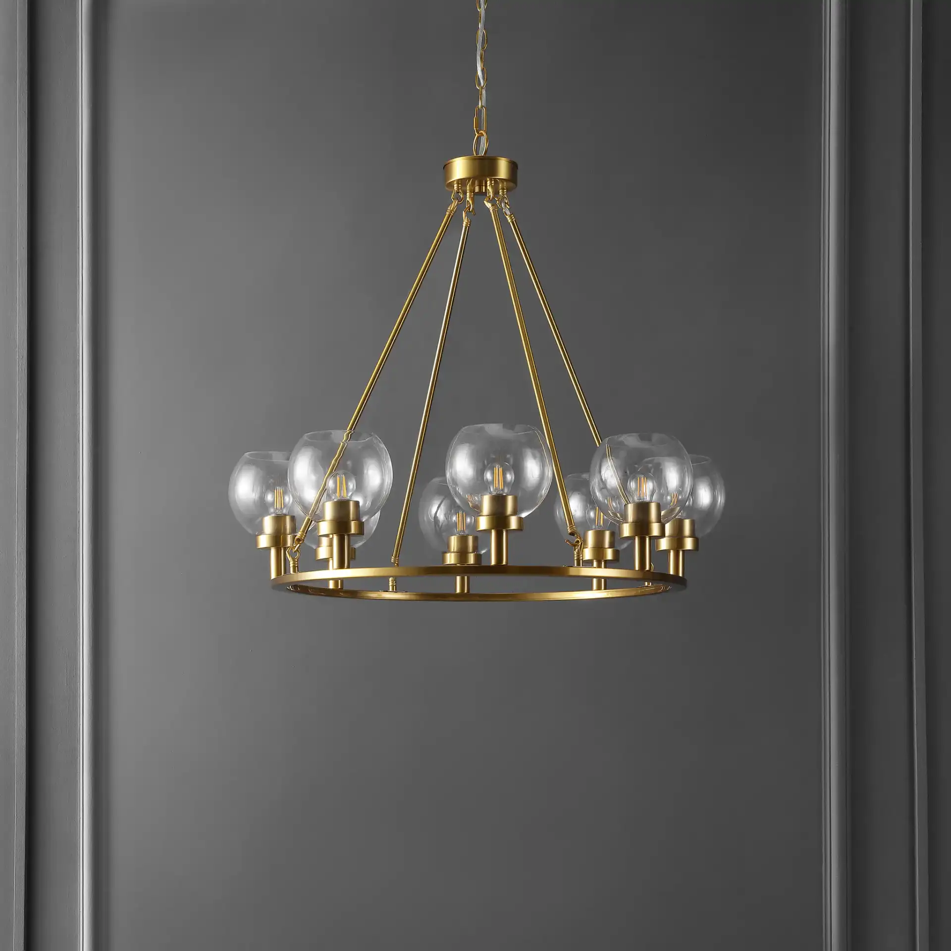 Sveda Eight-Light Chandelier in Brass in a styled room