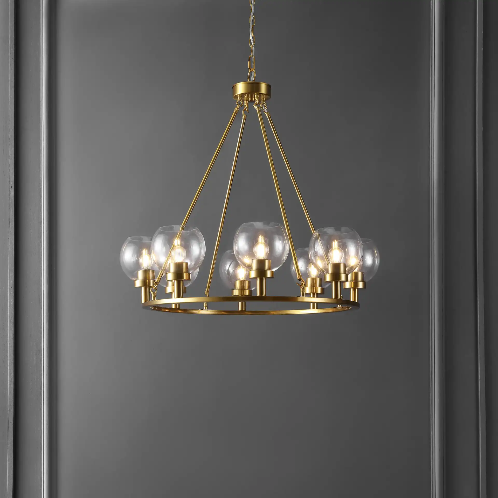 Sveda Eight-Light Chandelier in Brass in a styled room