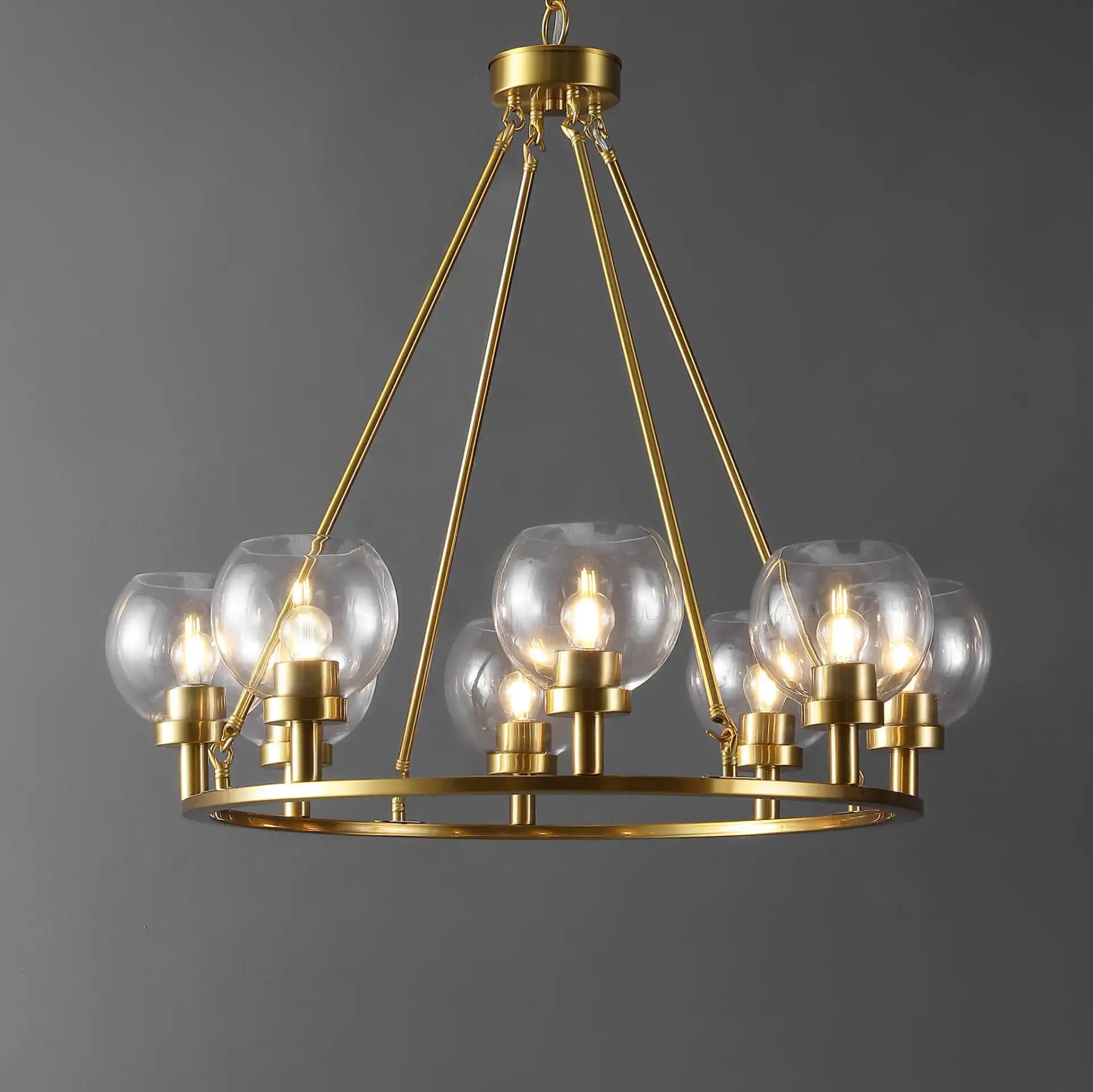 Sveda Eight-Light Chandelier in Brass in a styled room