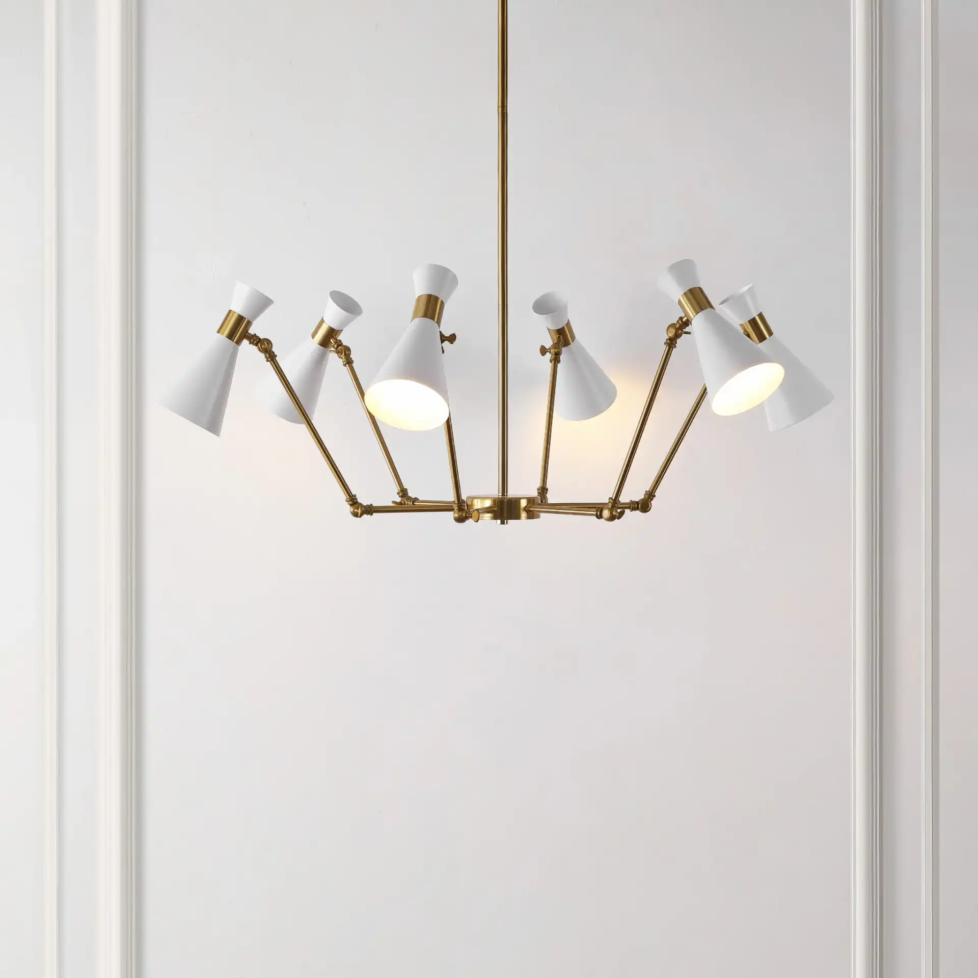 Shiraz Six-Light Chandelier in Brass / White in a styled room