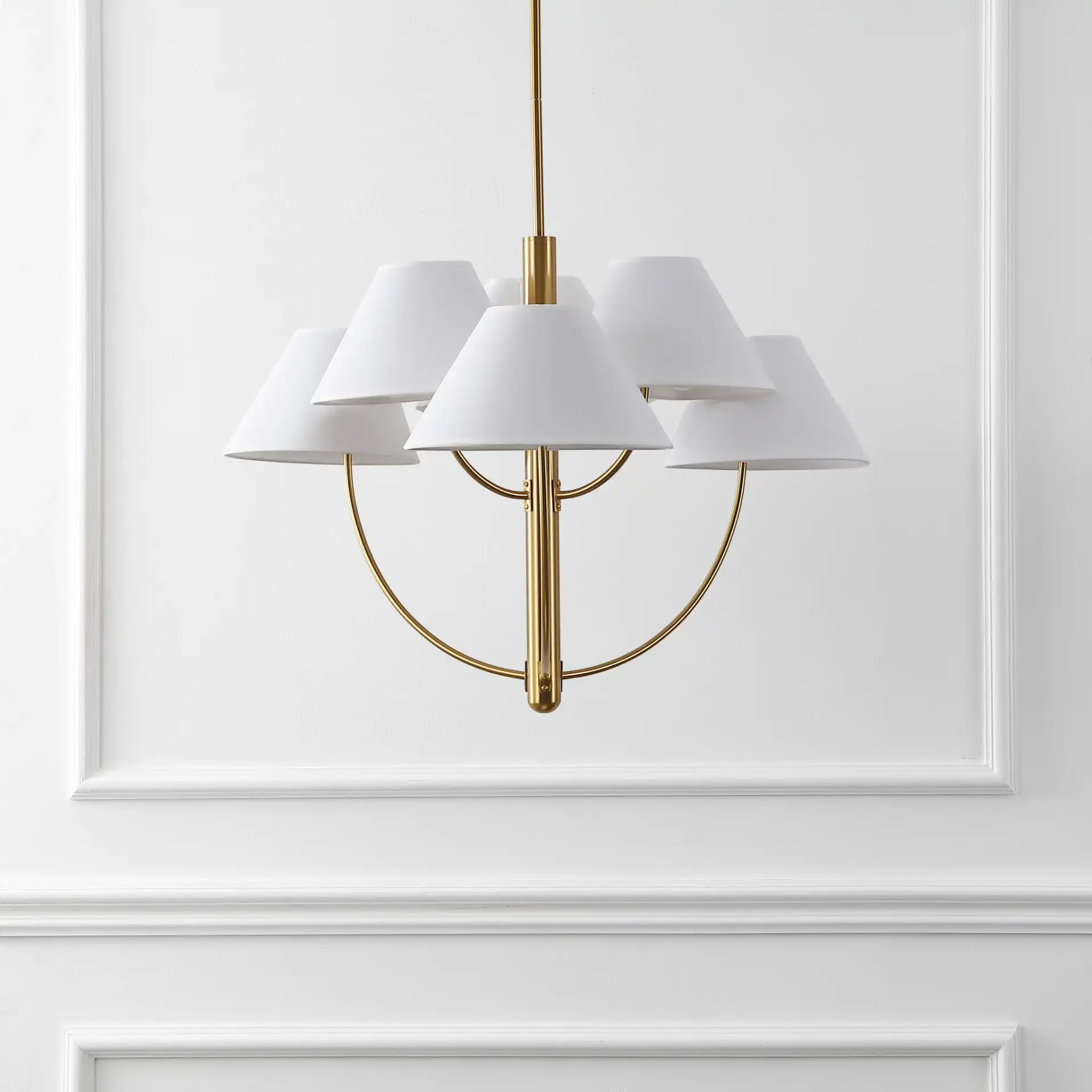 Madsen Six-Light Chandelier in Brass in a styled room