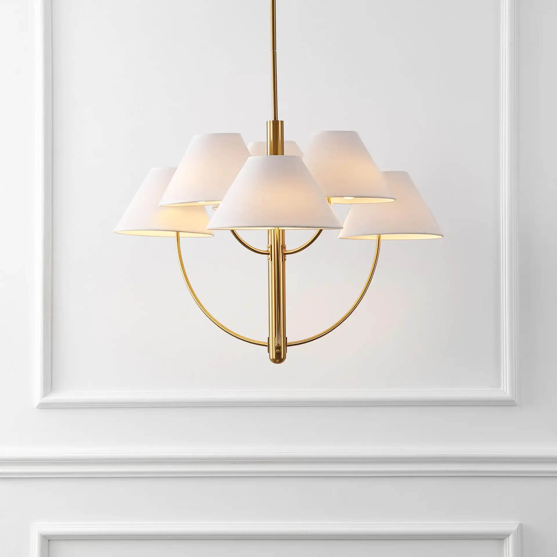 Madsen Six-Light Chandelier in Brass in a styled room