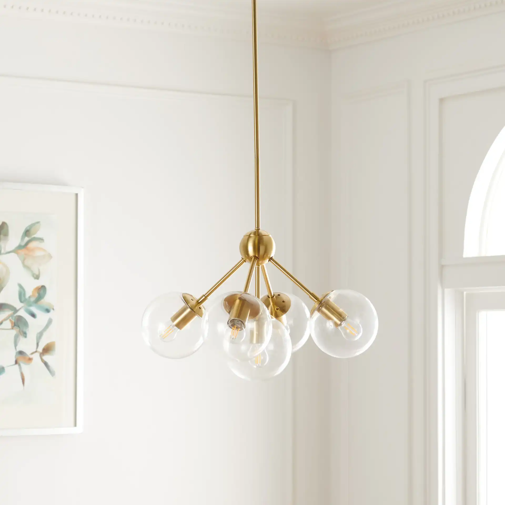 Aderynn Five-Light Chandelier in Gold in a styled room