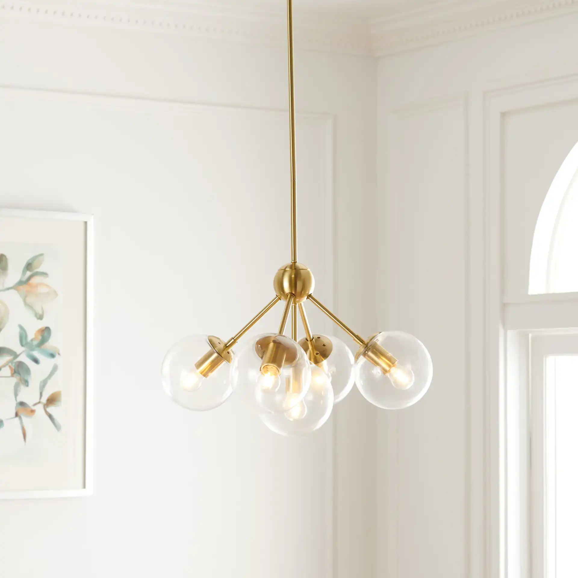 Aderynn Five-Light Chandelier in Gold in a styled room