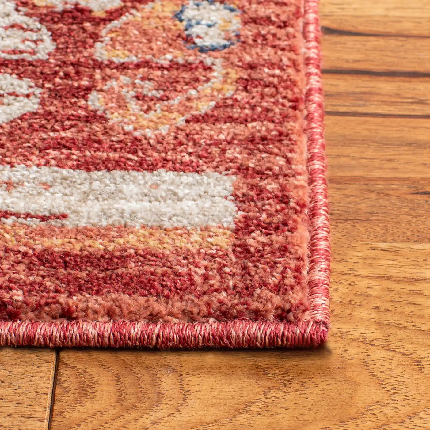 Charleston Banded Geometric Rug in Rust / Ivory in a styled room