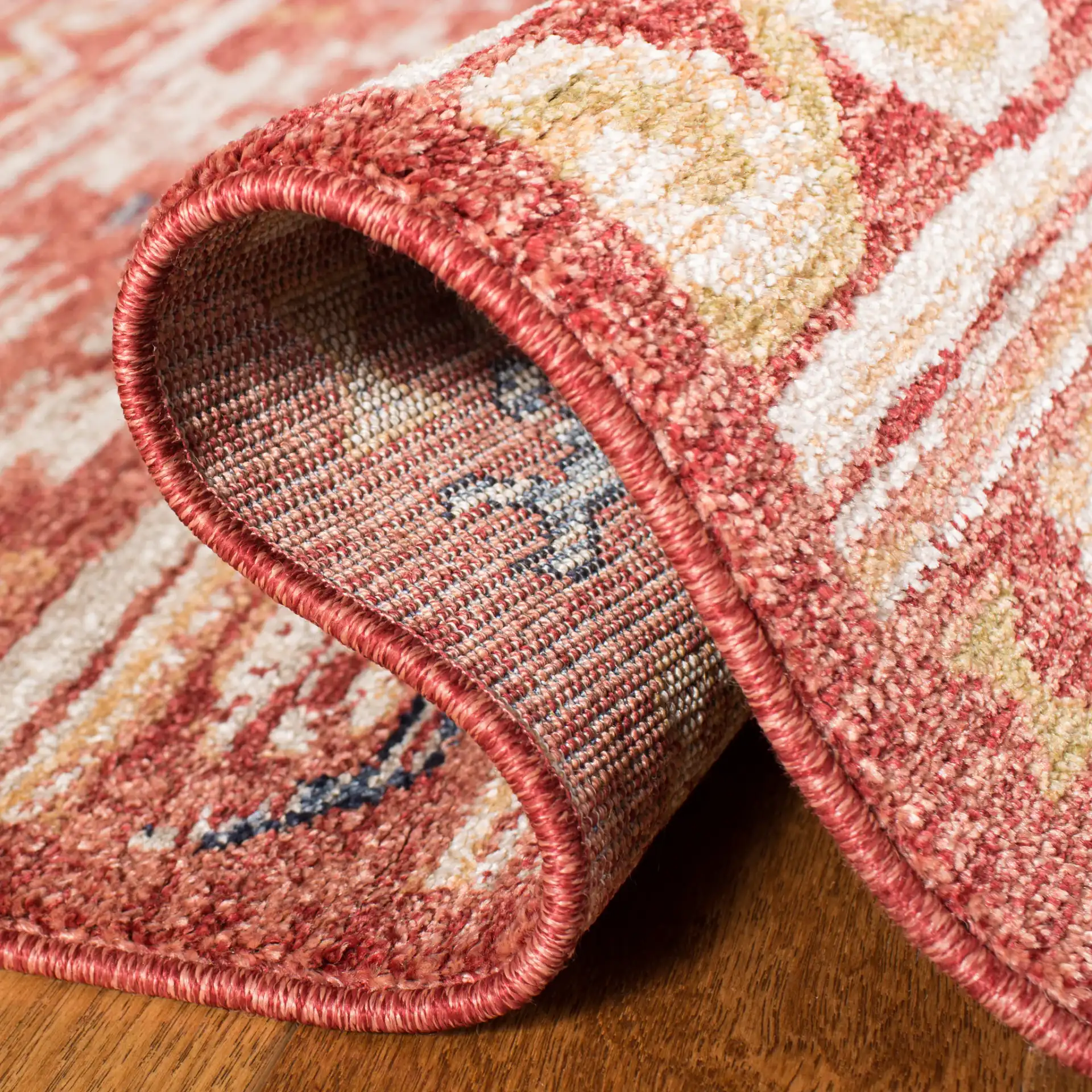 Charleston Banded Geometric Rug in Rust / Ivory in a styled room