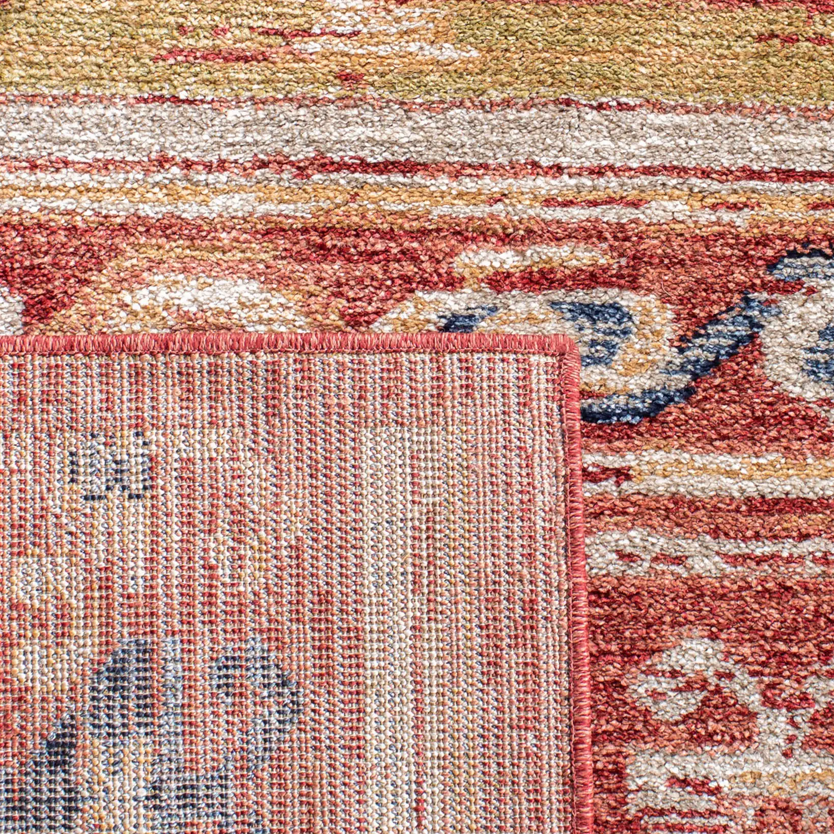 Charleston Banded Geometric Rug in Rust / Ivory in a styled room