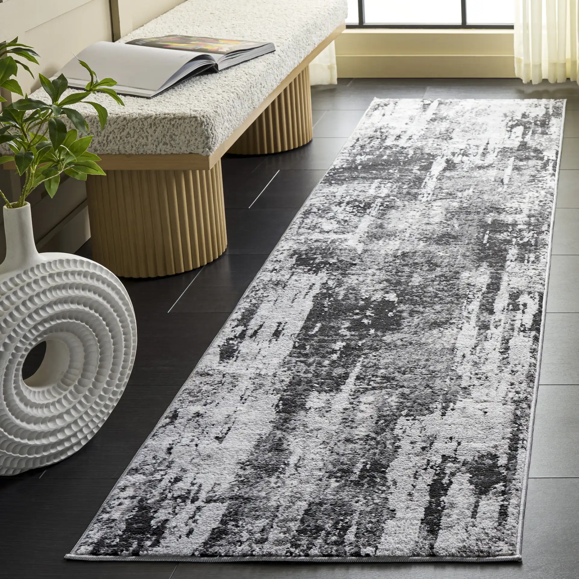 Chamber Abstract Rug in Gray / Dark Gray in a styled room