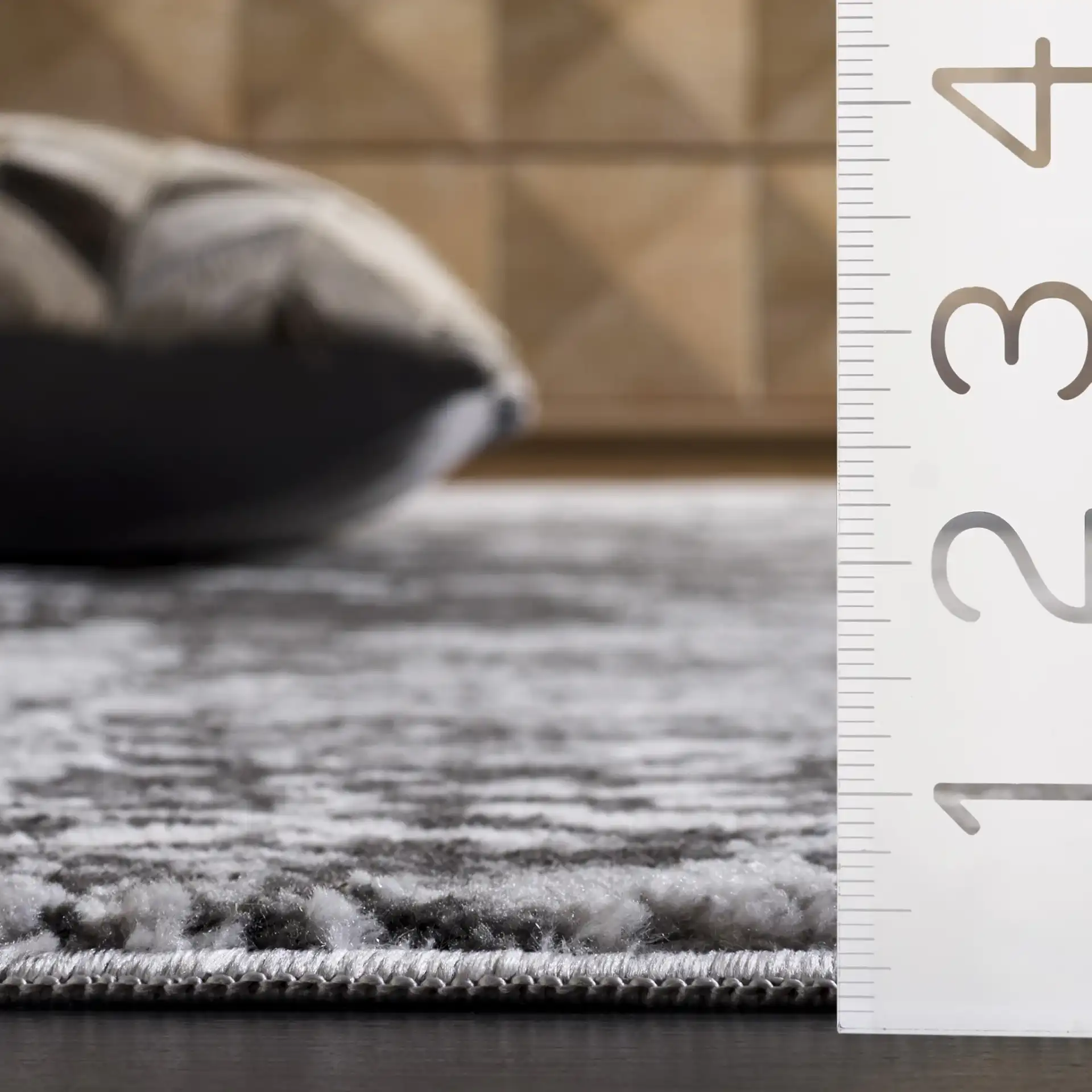 Chamber Abstract Rug in Gray / Dark Gray in a styled room