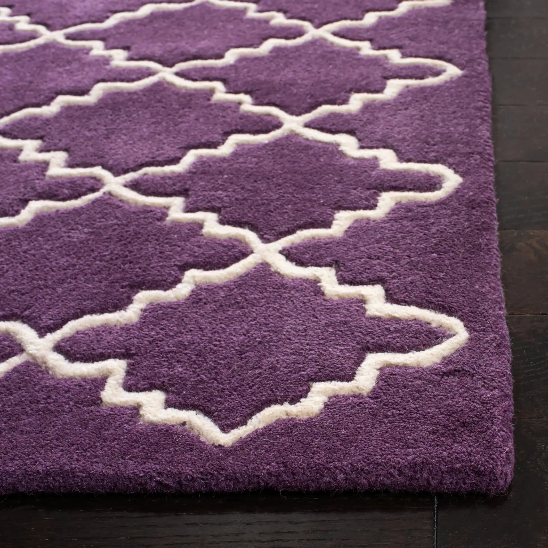 Chatham Stepped Trellis Hand-Tufted Wool Rug in Purple / Ivory in a styled room