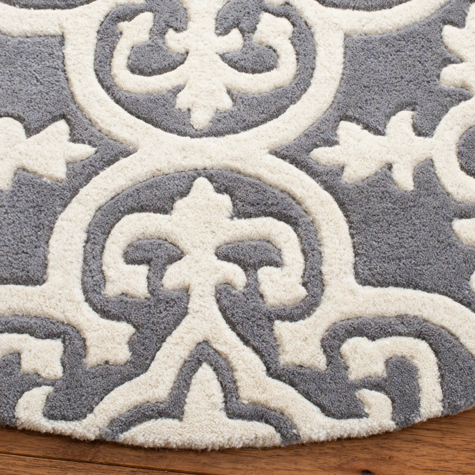 Chatham Tile Trellis Hand-Tufted Wool Rug in Dark Gray / Ivory in a styled room