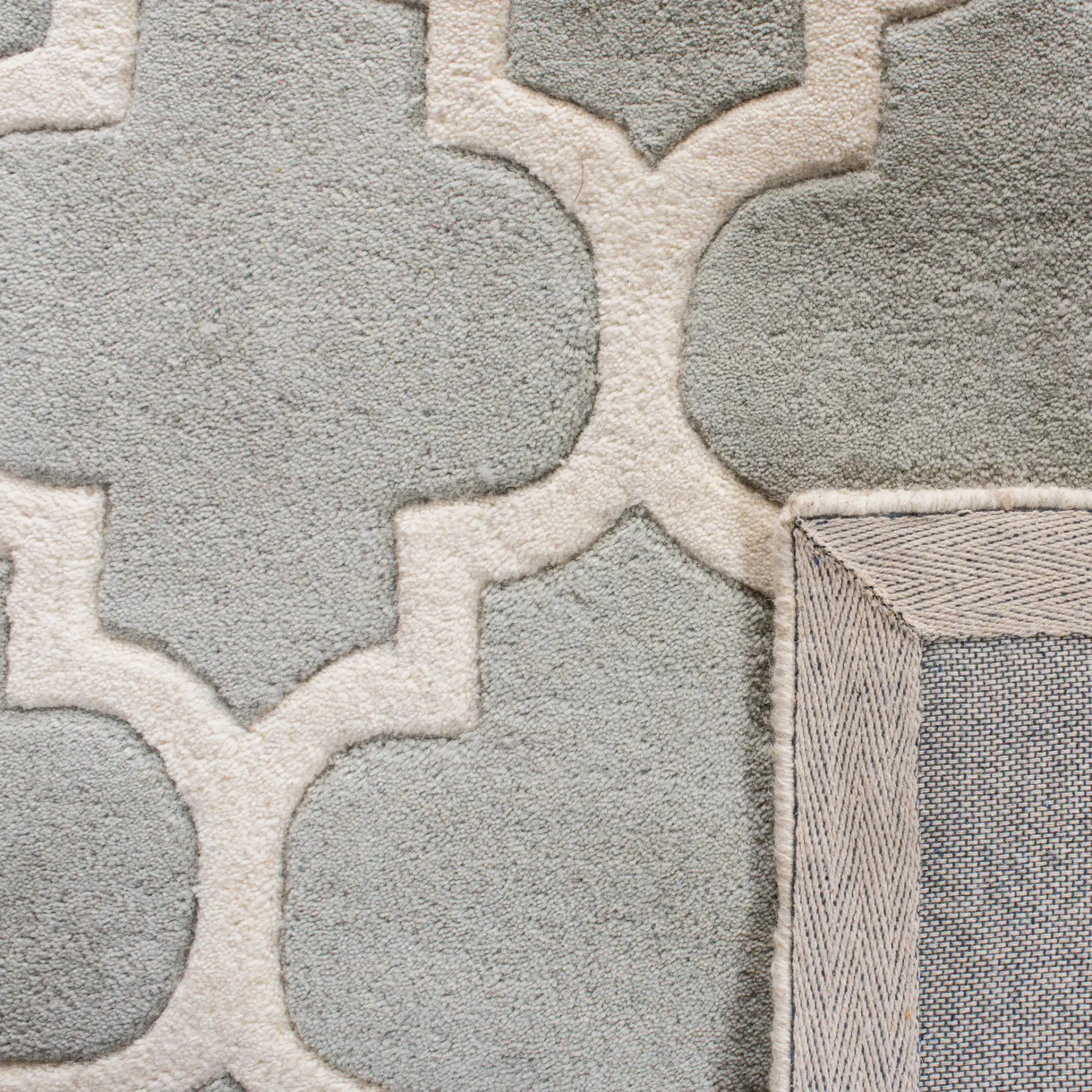 Chatham Lantern Trellis Hand-Tufted Wool Rug in Gray / Ivory in a styled room