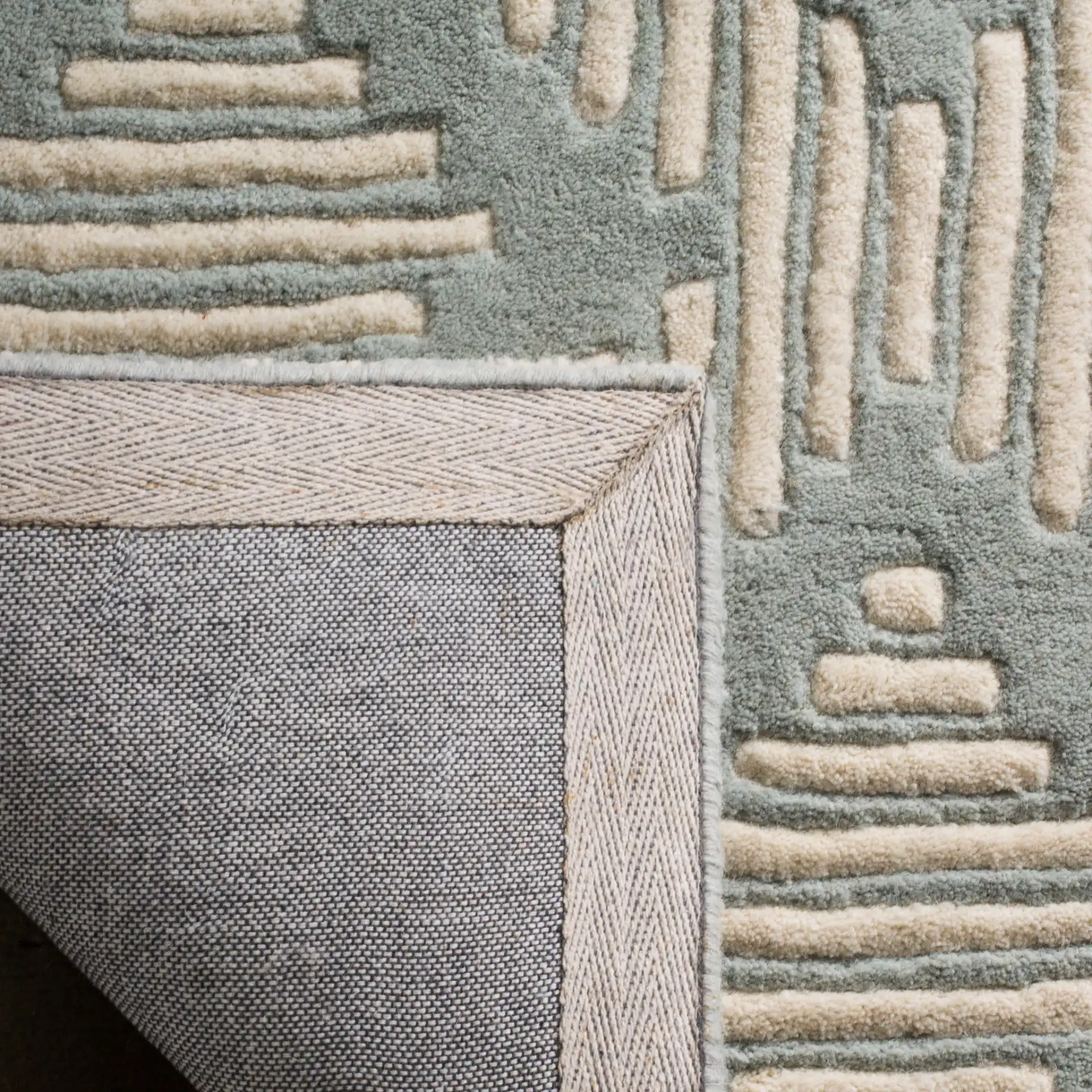 Chatham Dashed Diamond Hand-Tufted Wool Rug in Gray / Ivory in a styled room