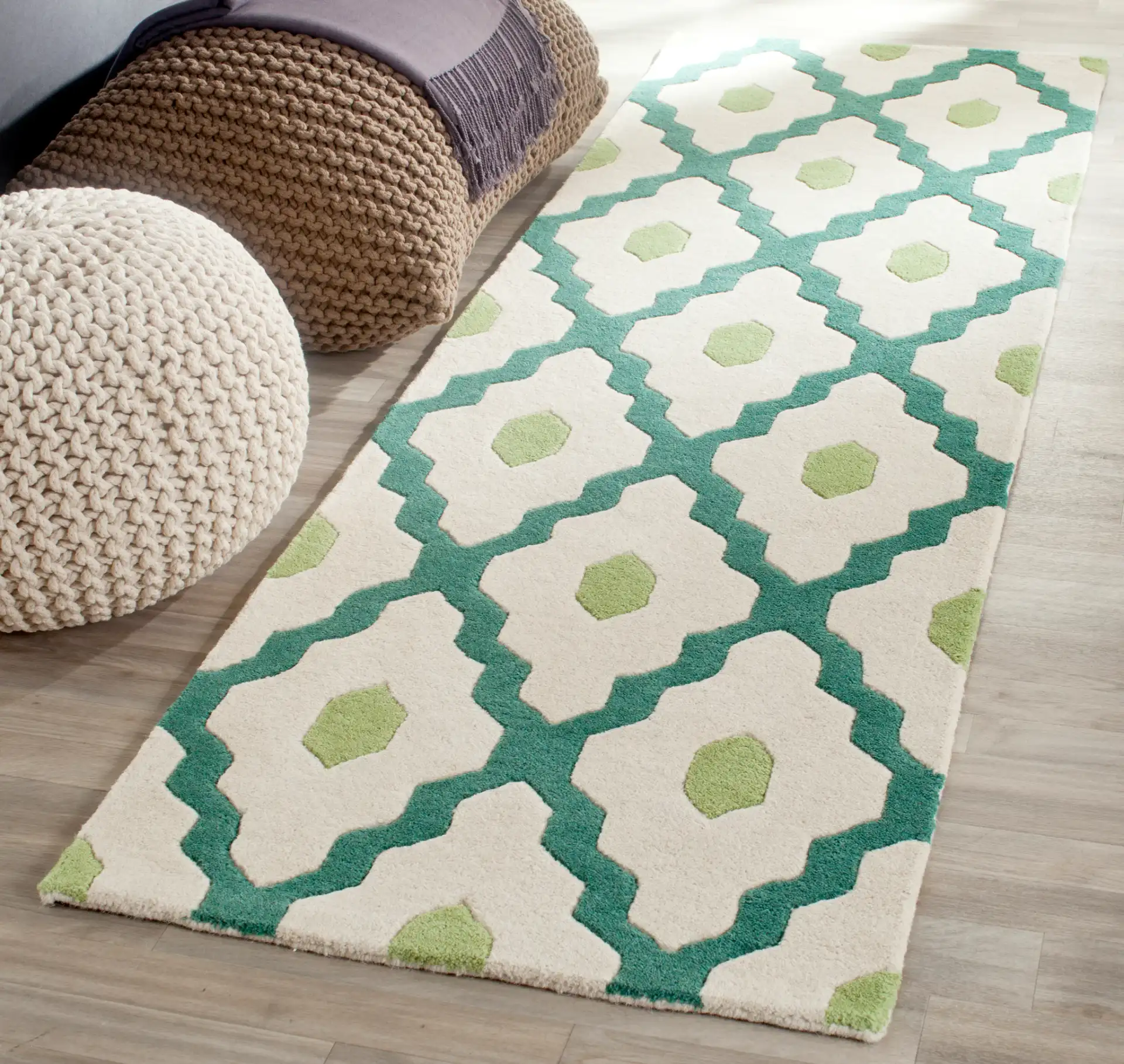 Chatham Ogee Hand-Tufted Wool Rug in Ivory / Teal in a styled room