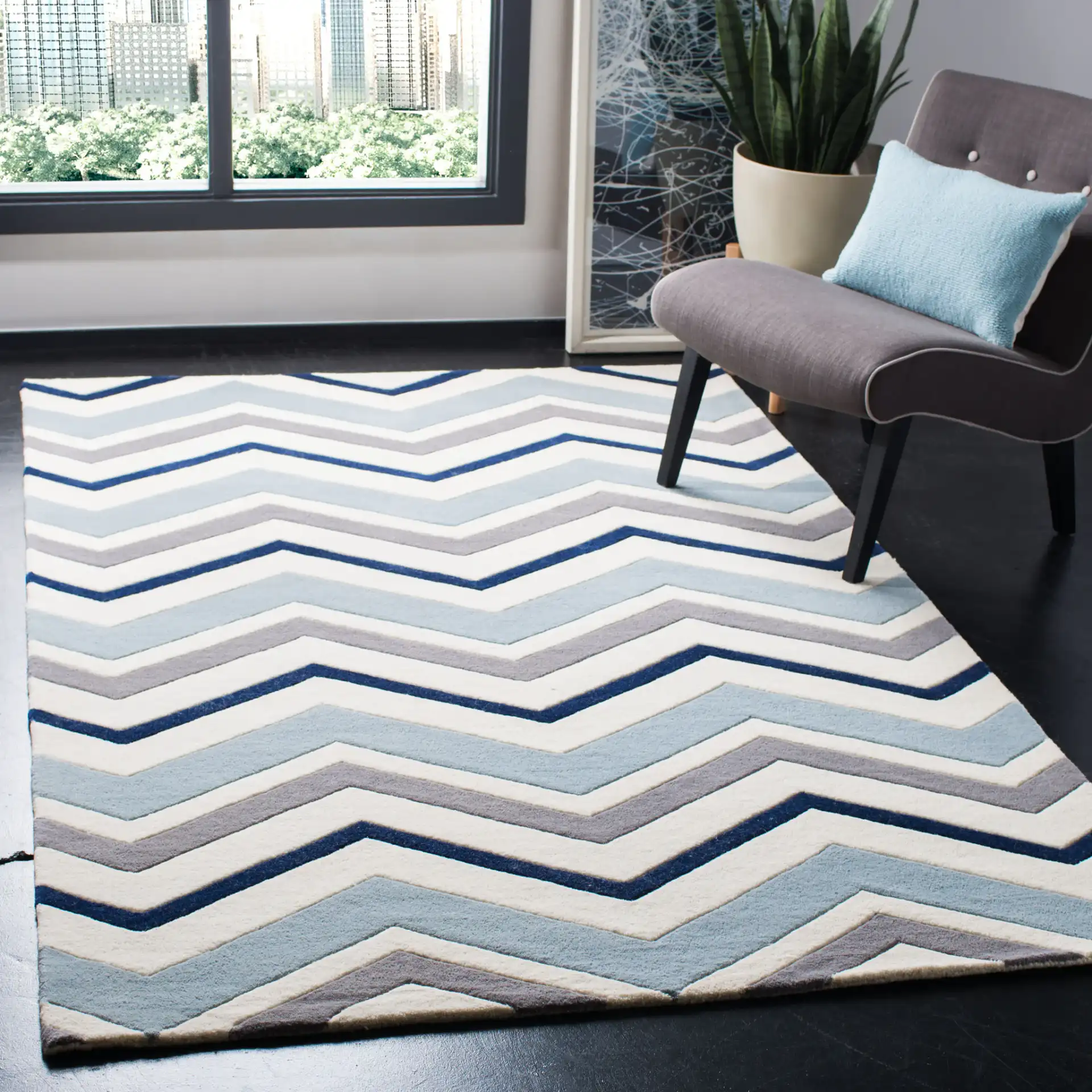 Chatham Wide Chevron Hand-Tufted Wool Rug in Ivory / Dark Gray in a styled room