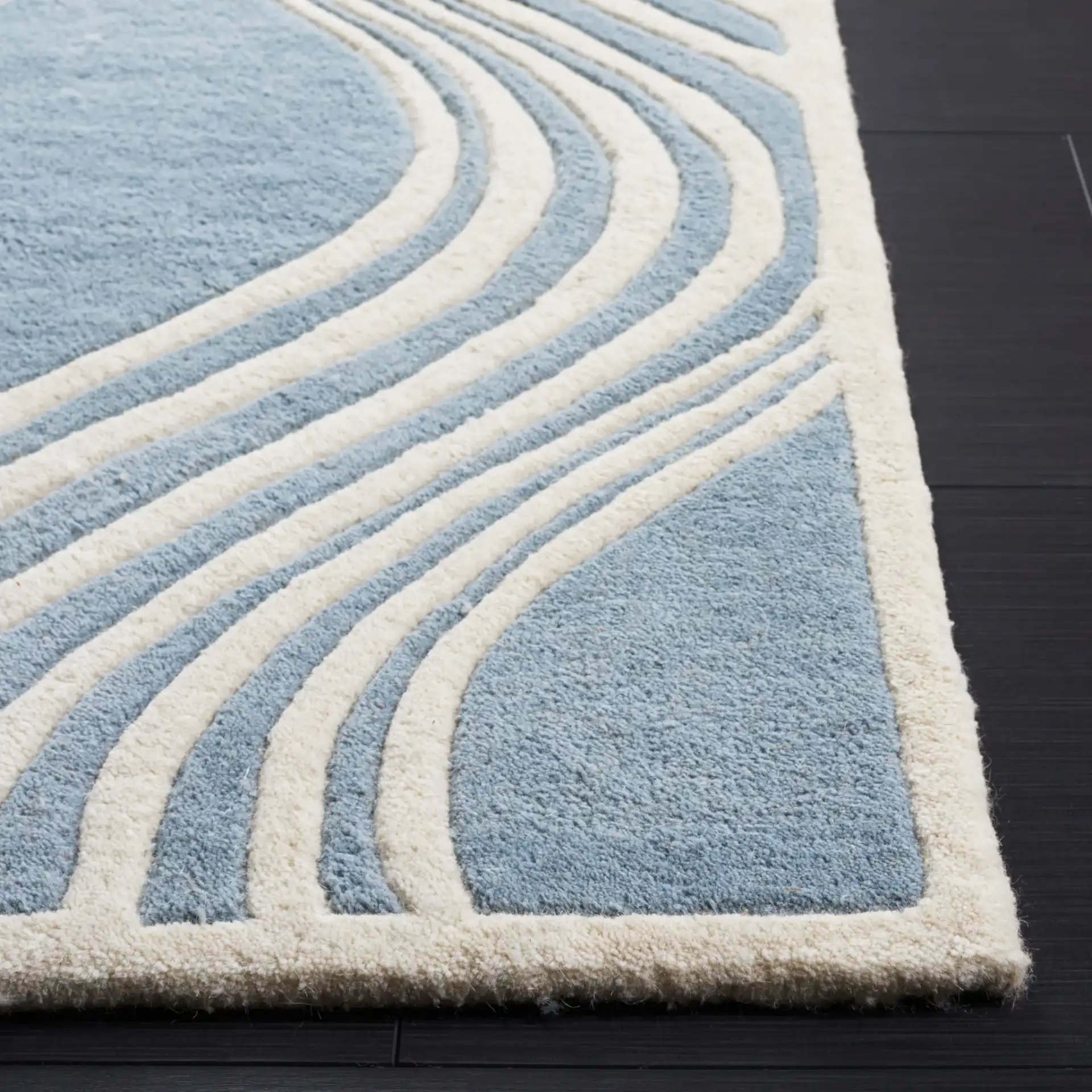 Chatham Wavy Trellis Hand-Tufted Wool Rug in Blue / Ivory in a styled room