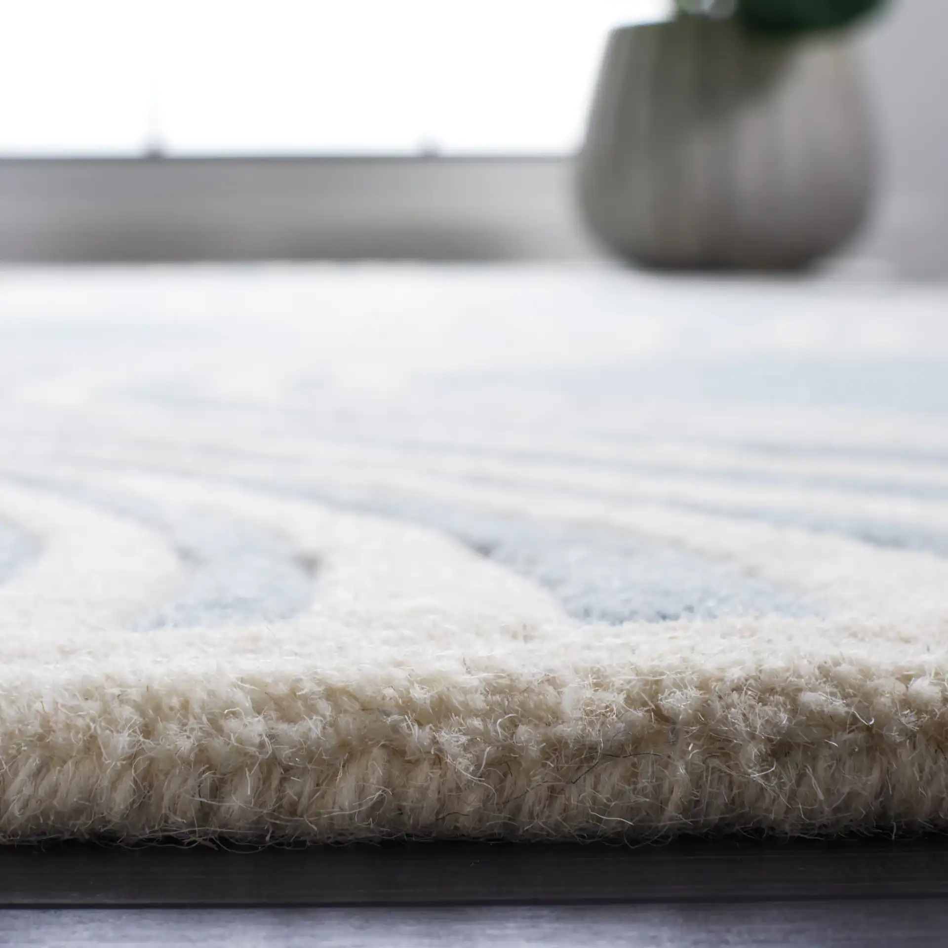 Chatham Wavy Trellis Hand-Tufted Wool Rug in Blue / Ivory in a styled room