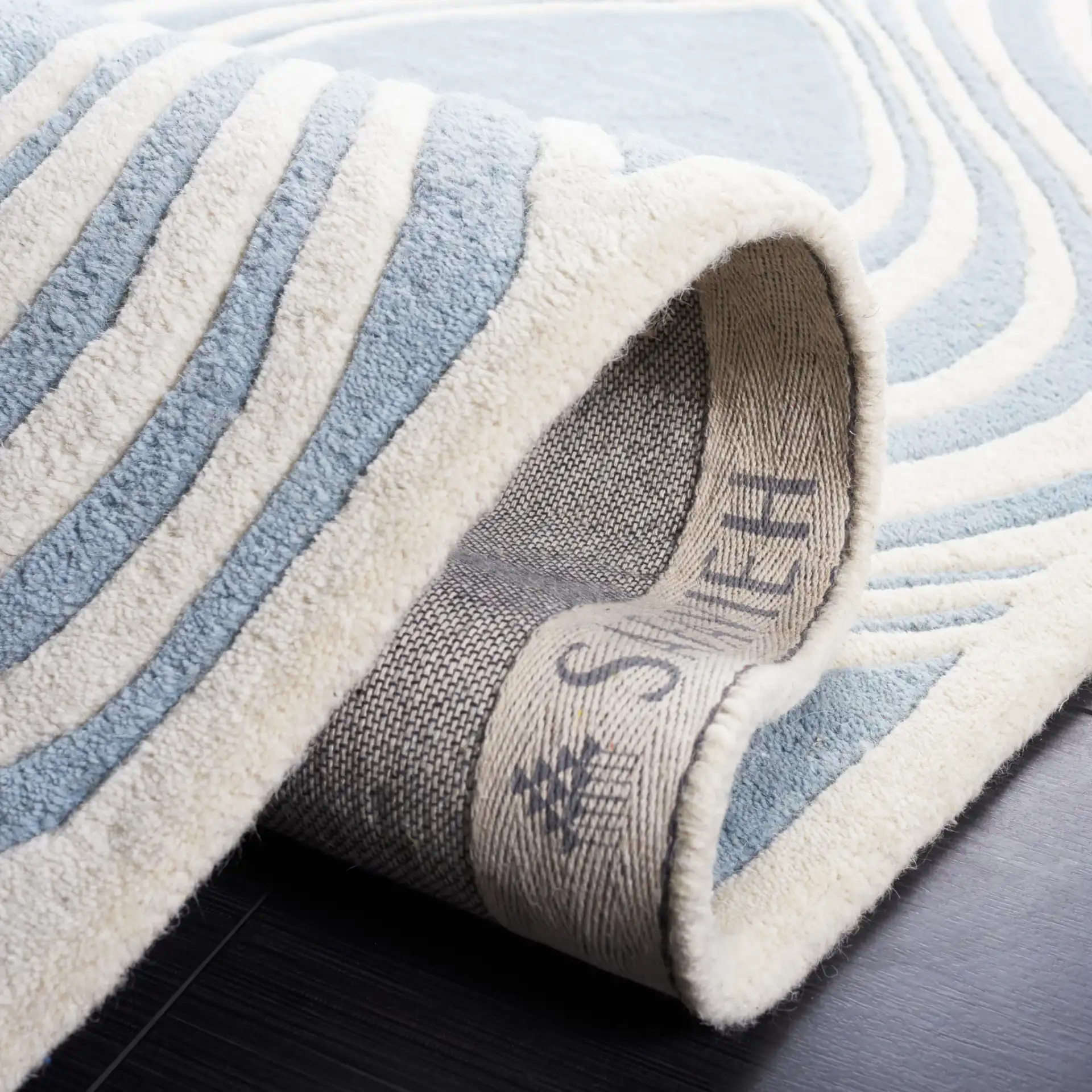 Chatham Wavy Trellis Hand-Tufted Wool Rug in Blue / Ivory in a styled room