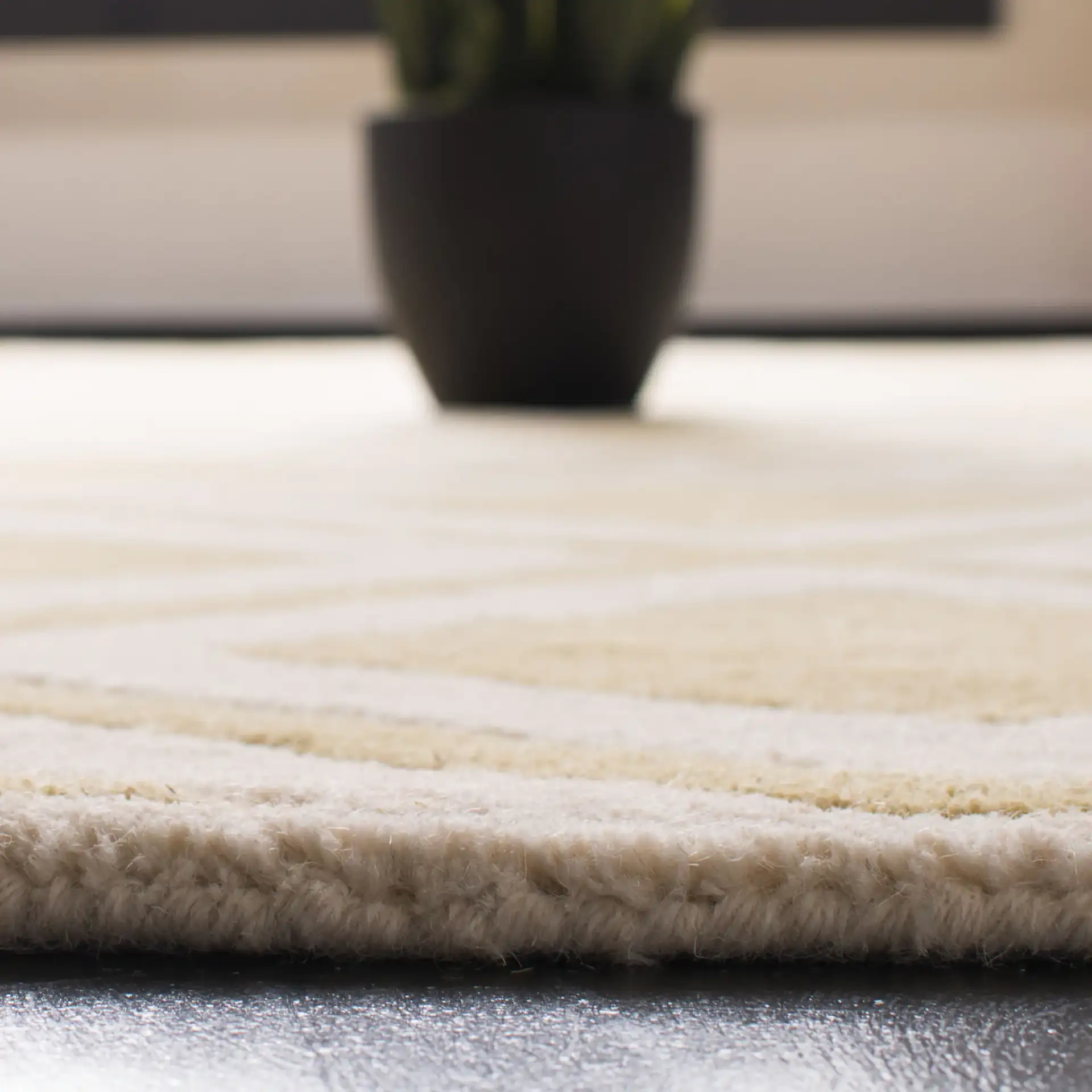 Chatham Nested Diamond Grid Hand-Tufted Wool Rug in Gold / Ivory in a styled room